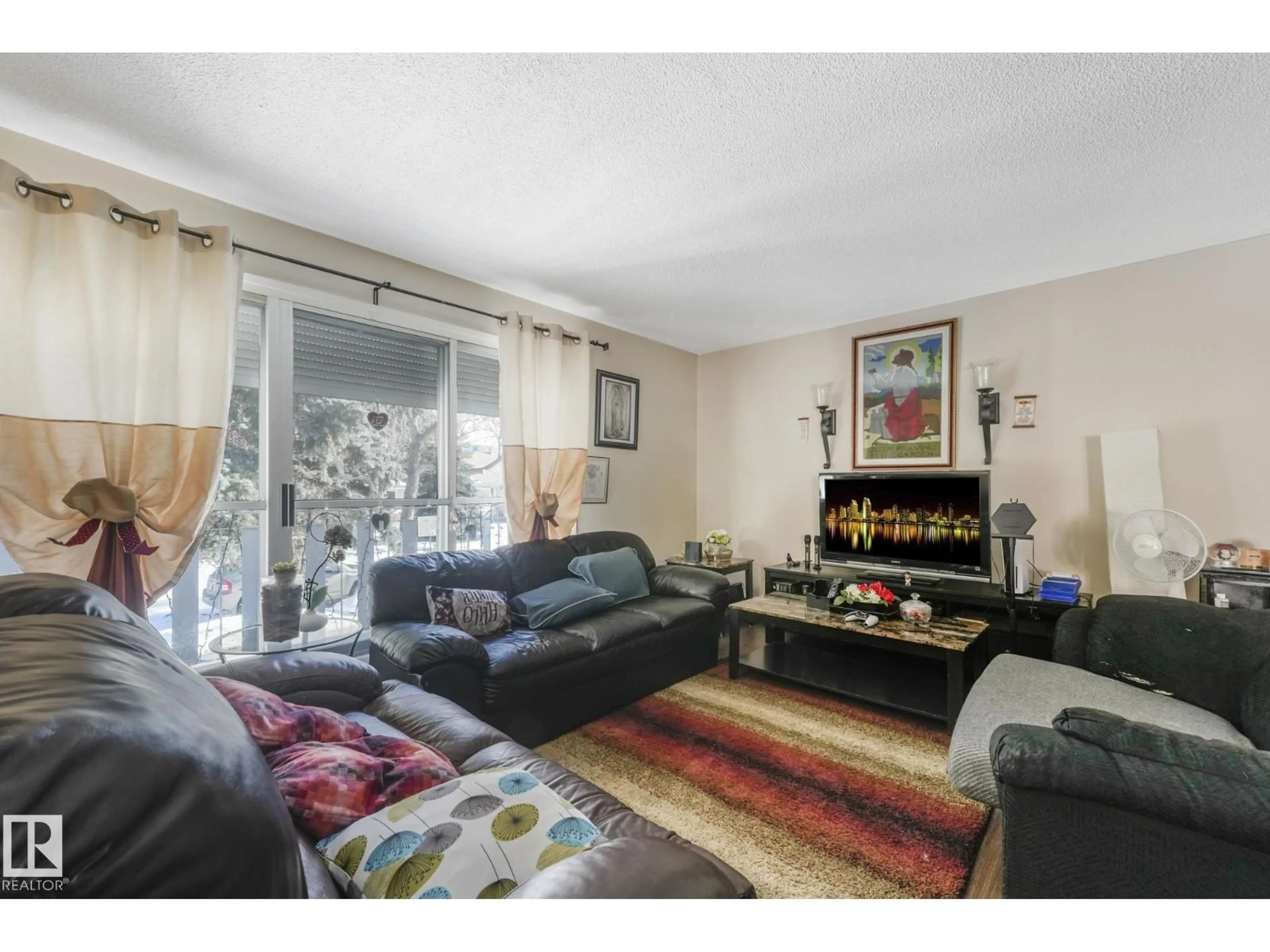 Living room with furniture, unknown for NW - 10418-20 147 ST, Edmonton Alberta T5N3C5