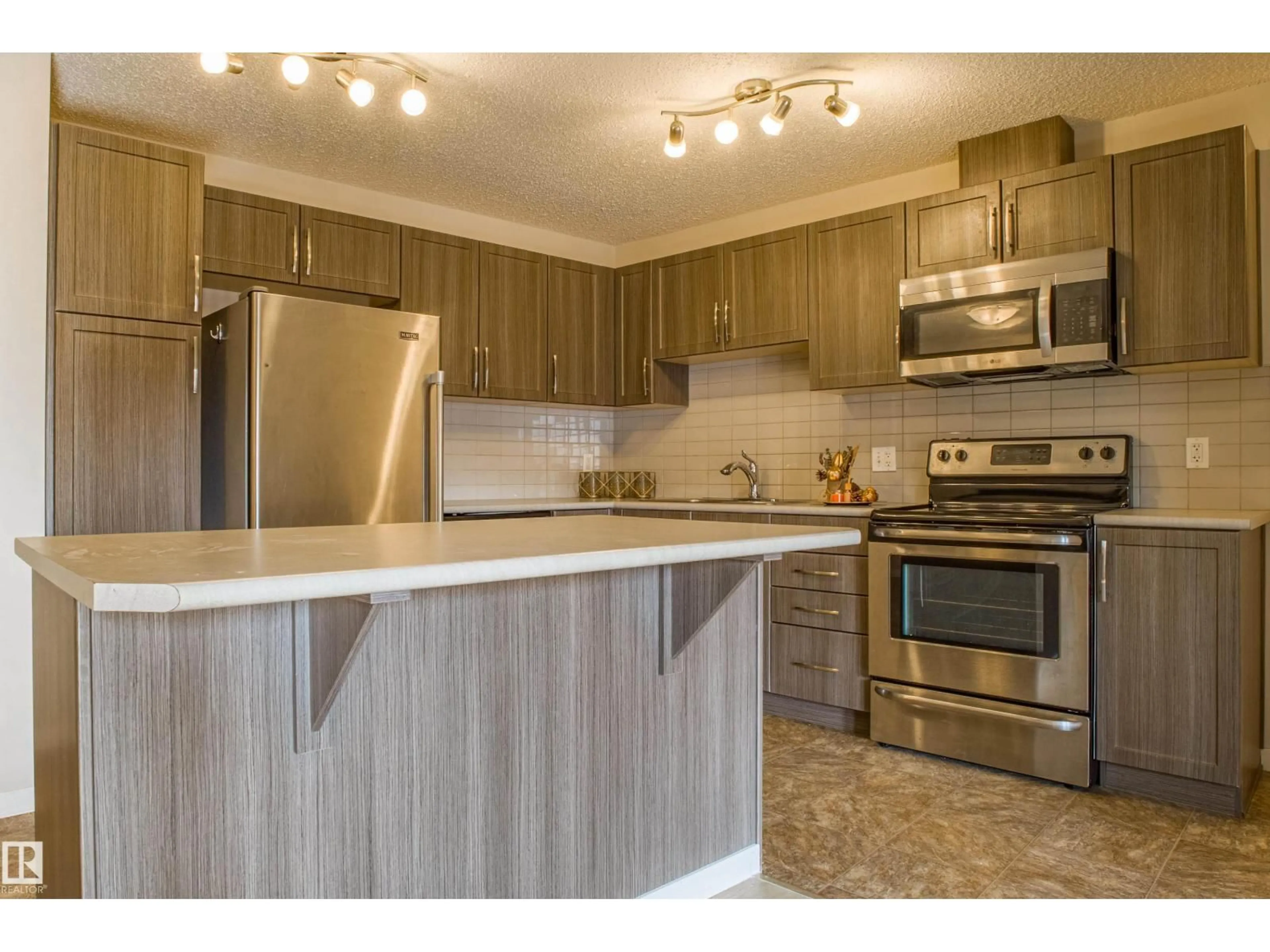 Standard kitchen, wood/laminate floor for #211 - 1820 RUTHERFORD RD, Edmonton Alberta T6W2K6