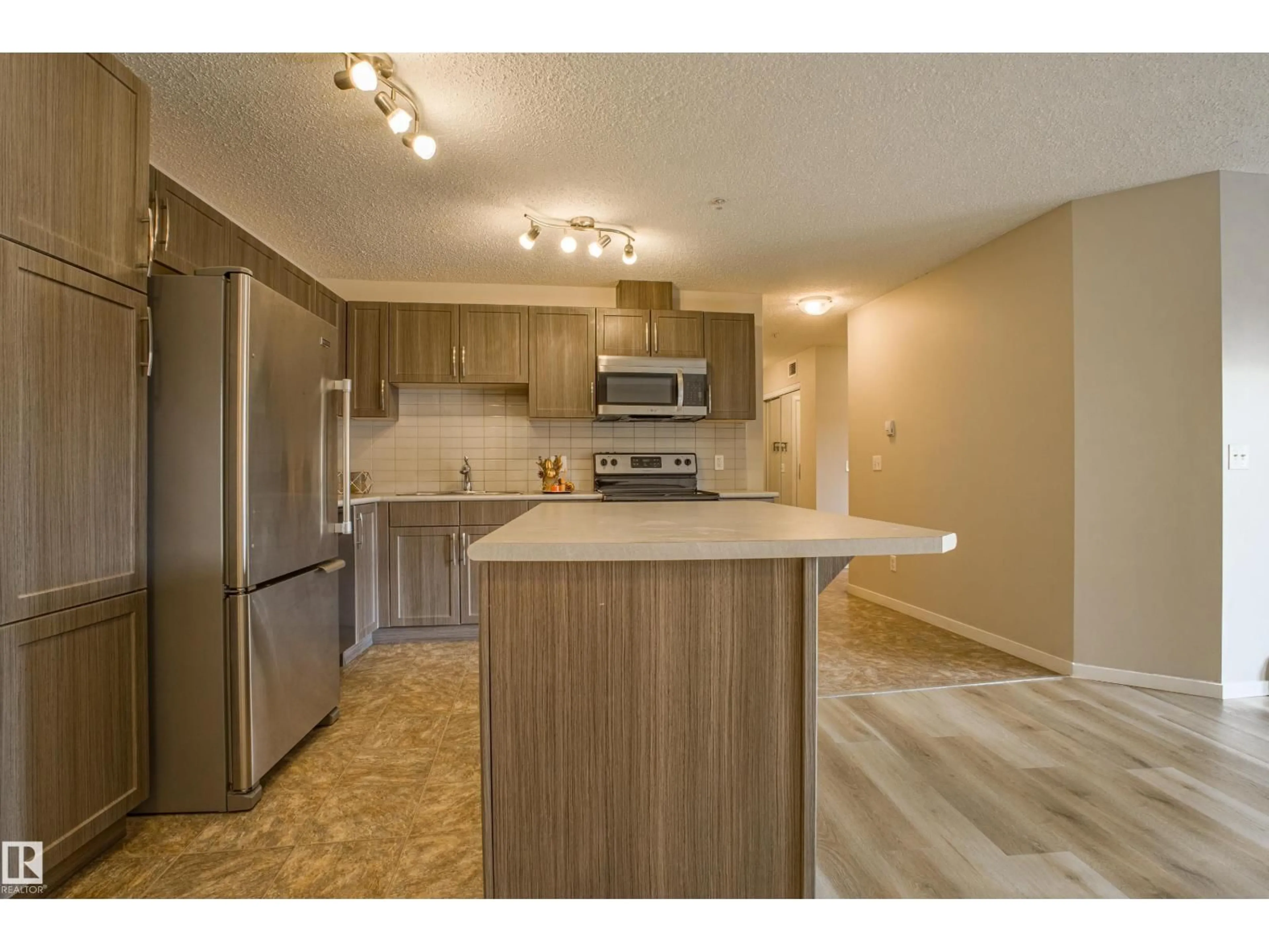 Standard kitchen, wood/laminate floor for #211 - 1820 RUTHERFORD RD, Edmonton Alberta T6W2K6