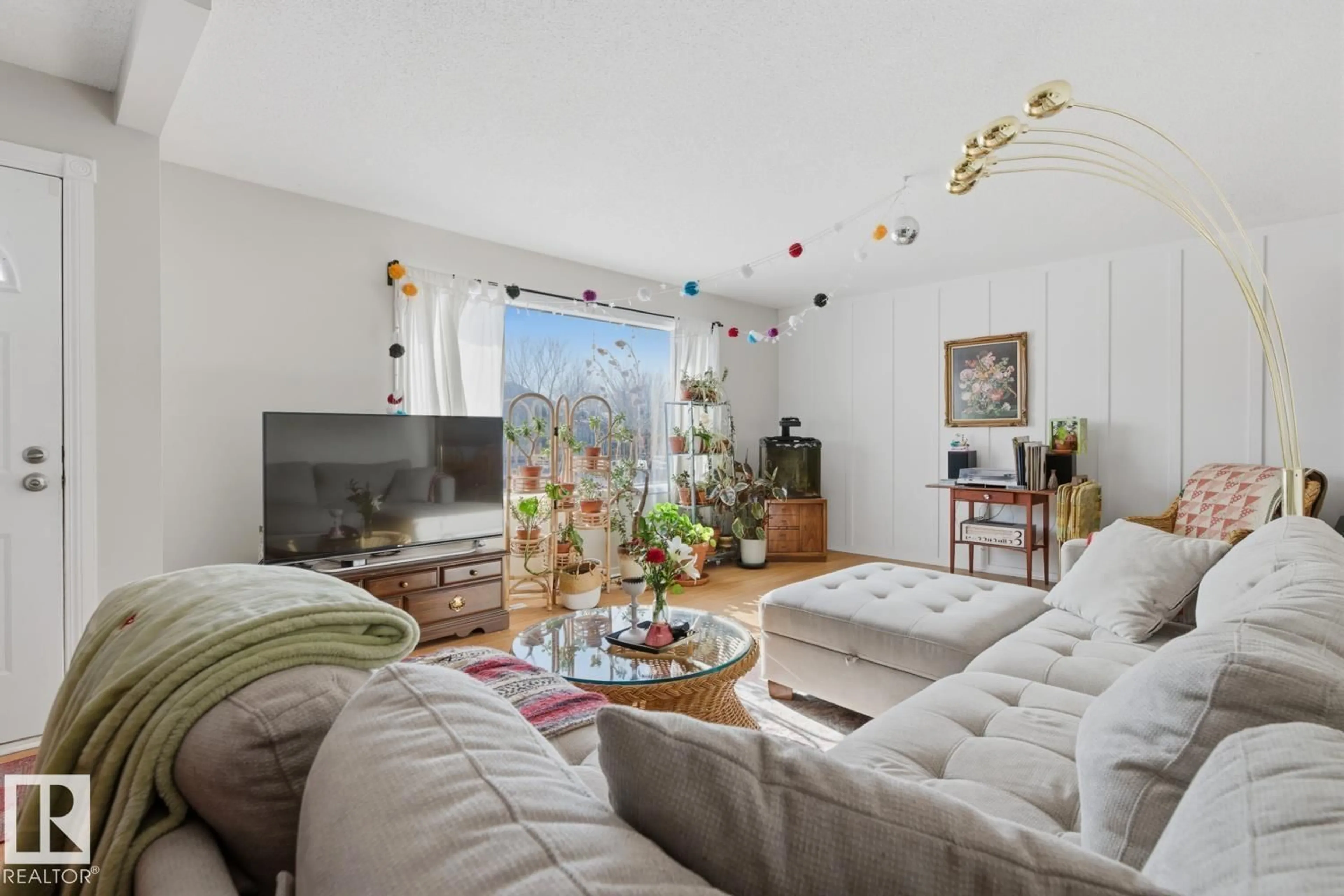 Living room with furniture, unknown for 11332 134 AV, Edmonton Alberta T5E1K6