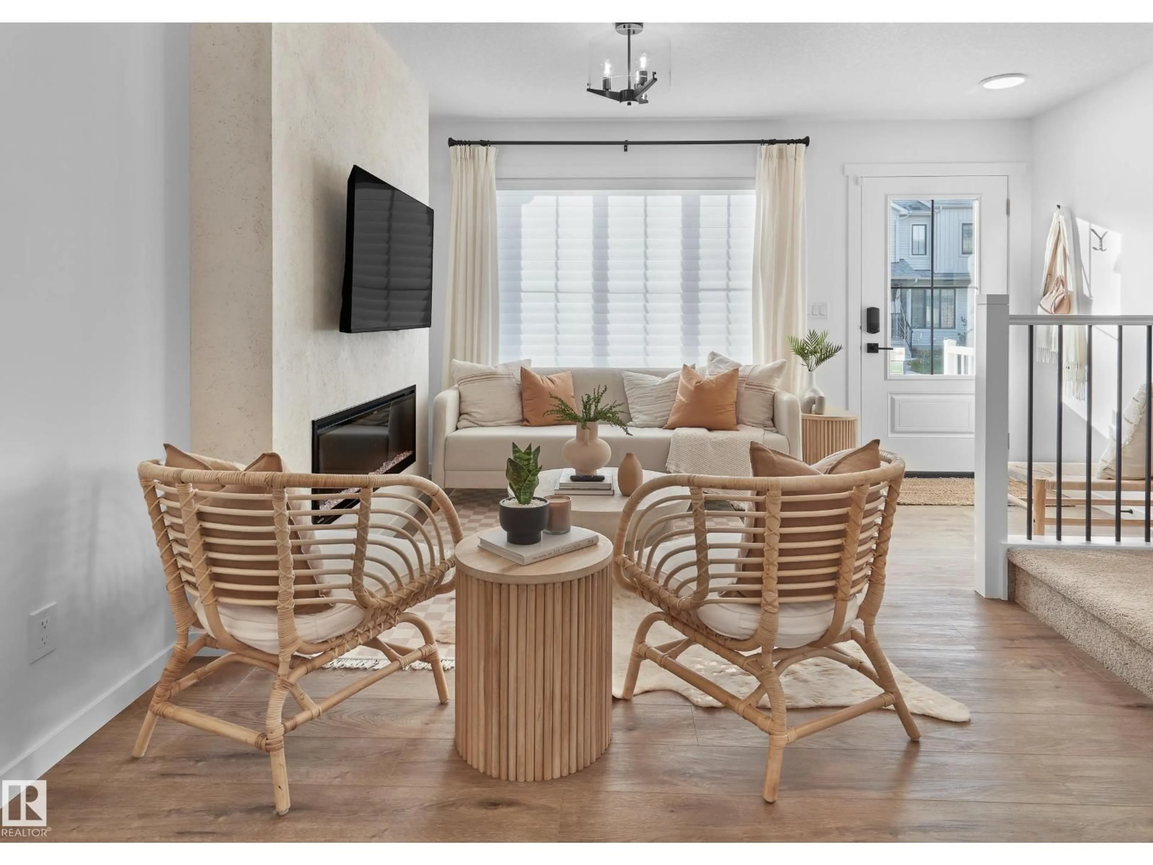 Living room with furniture, wood/laminate floor for NW - 1320 9 ST, Edmonton Alberta T6T2W2