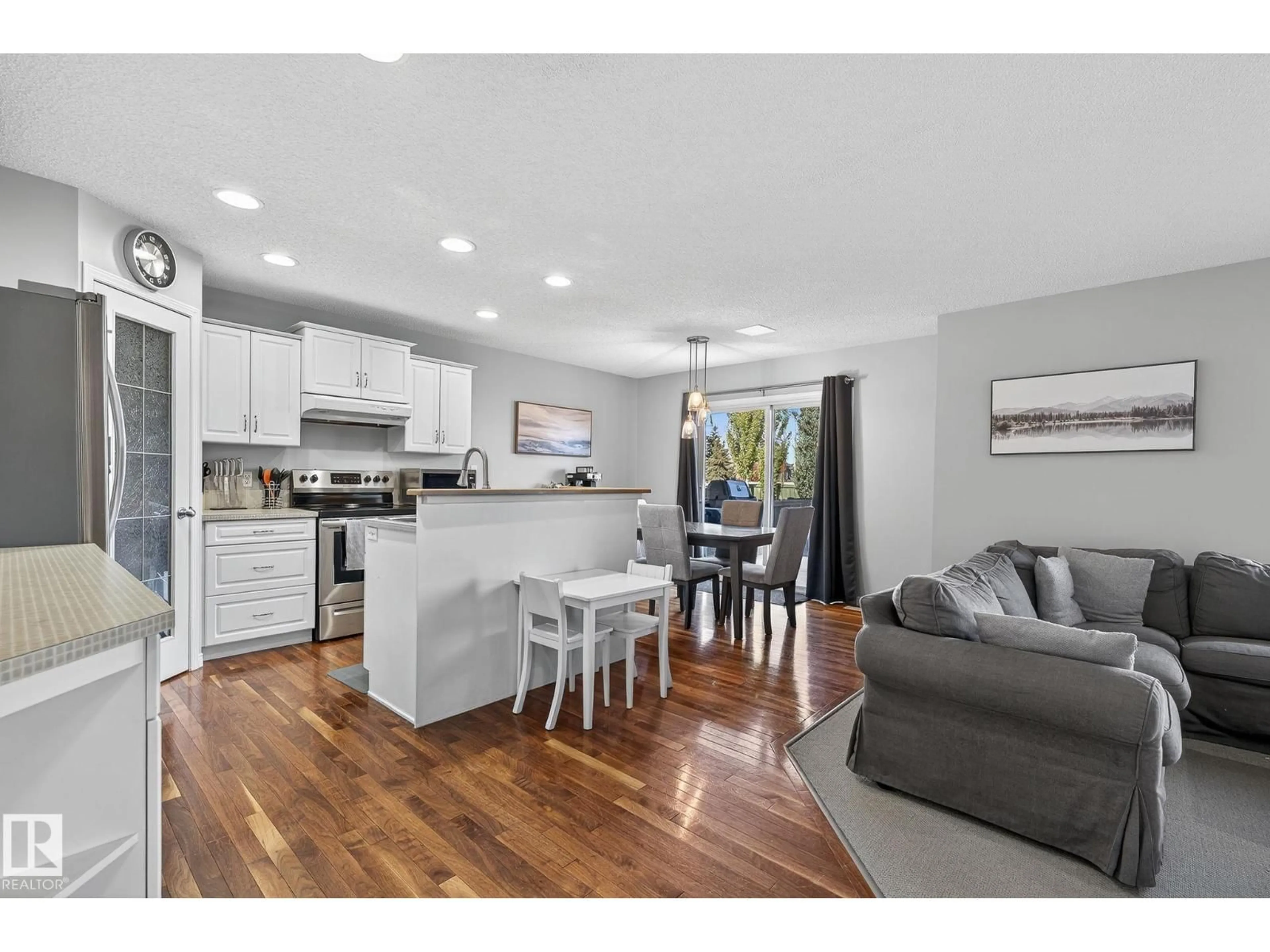 Open concept kitchen, wood/laminate floor for SW - 1147 RUTHERFORD CL, Edmonton Alberta T6W1H5