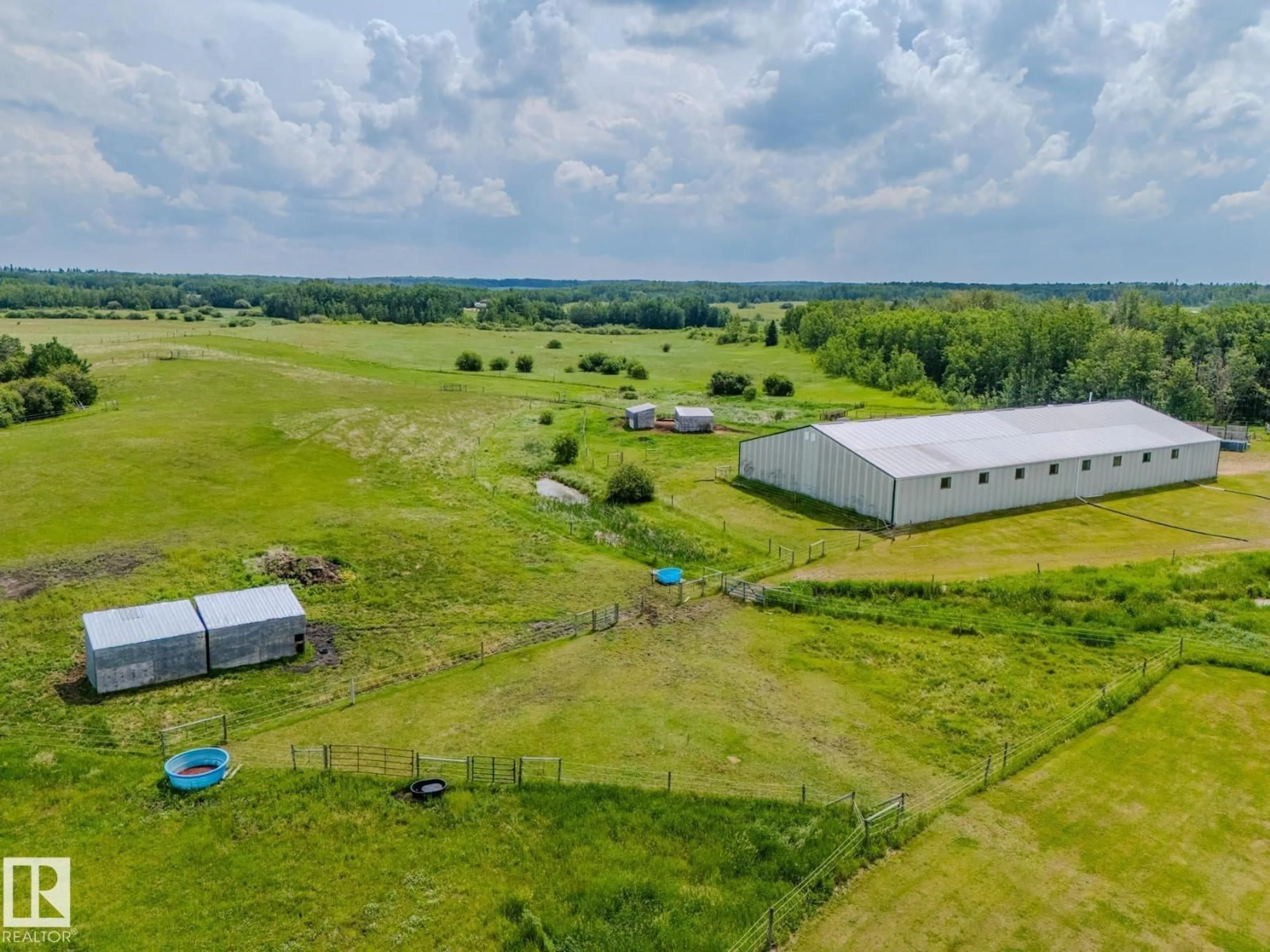 A pic from outside/outdoor area/front of a property/back of a property/a pic from drone, building for 53153 RGE ROAD 213, Rural Strathcona County Alberta T8G2C3