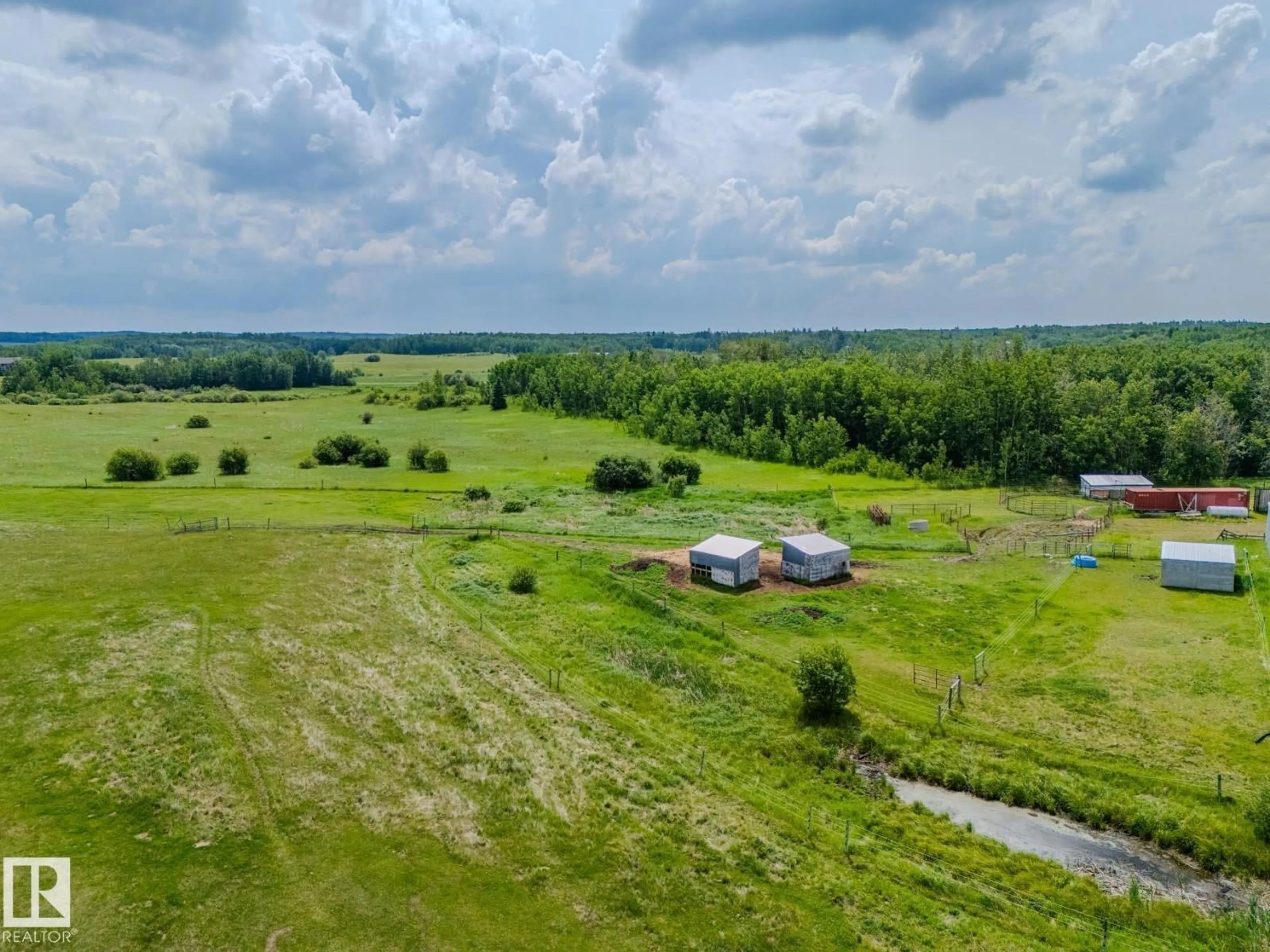A pic from outside/outdoor area/front of a property/back of a property/a pic from drone, water/lake/river/ocean view for 53153 RGE ROAD 213, Rural Strathcona County Alberta T8G2C3