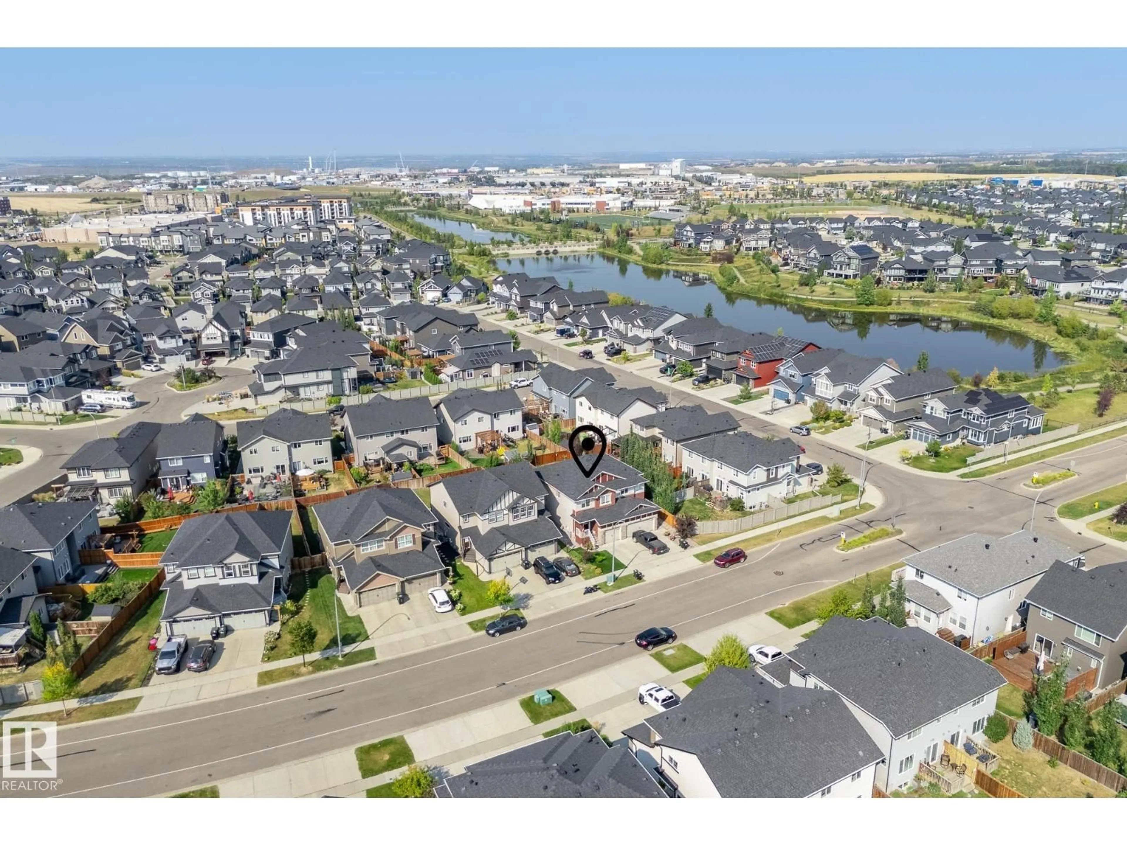 A pic from outside/outdoor area/front of a property/back of a property/a pic from drone, water/lake/river/ocean view for 130 ABBEY RD, Sherwood Park Alberta T8H0Z2