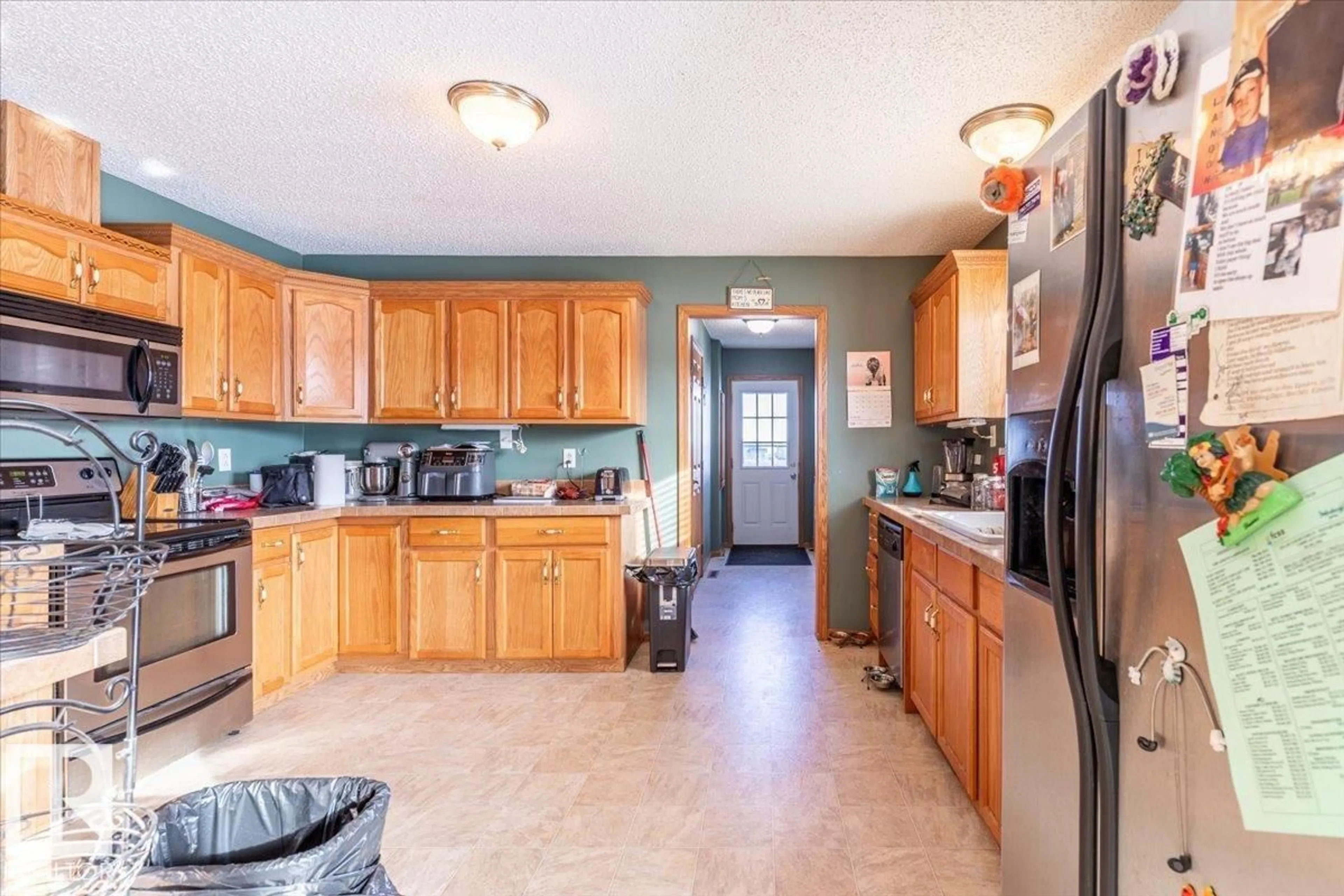 Open concept kitchen, ceramic/tile floor for 4 WOODBEND CR, Warburg Alberta T0C2T0