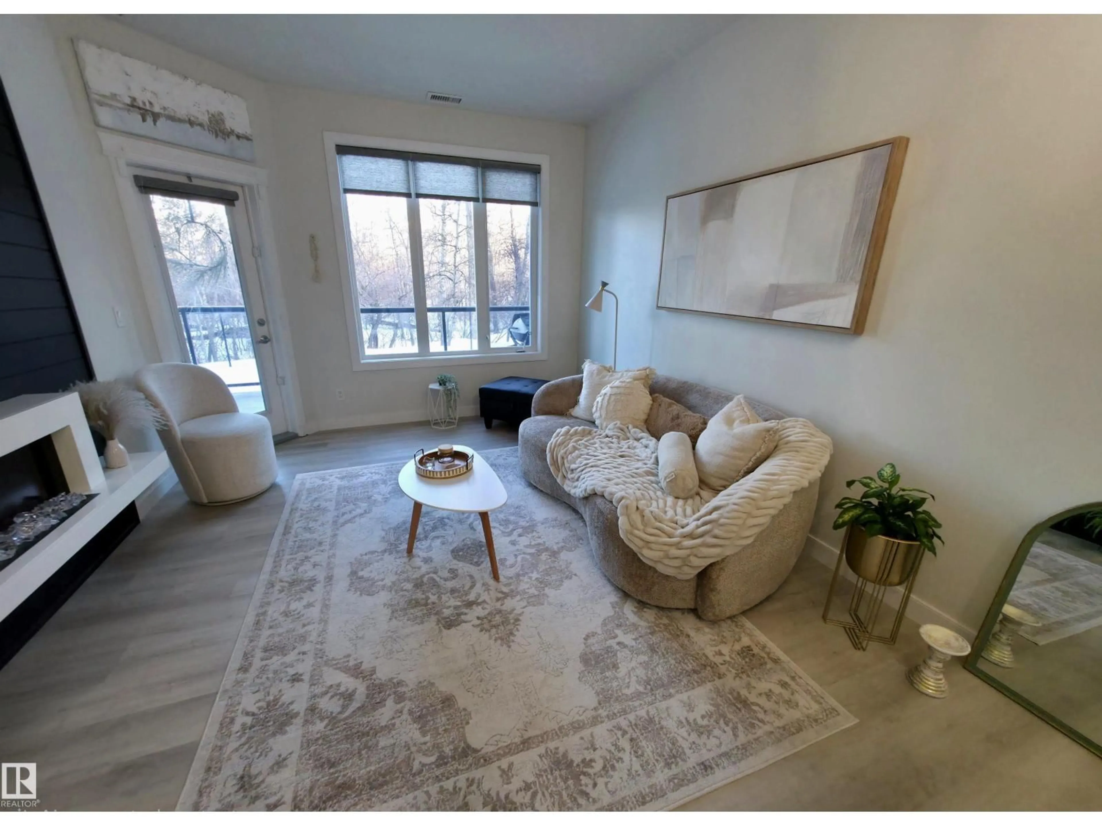 Living room with furniture, unknown for #112 - 4075 CLOVER BAR RD, Sherwood Park Alberta T8H2K6