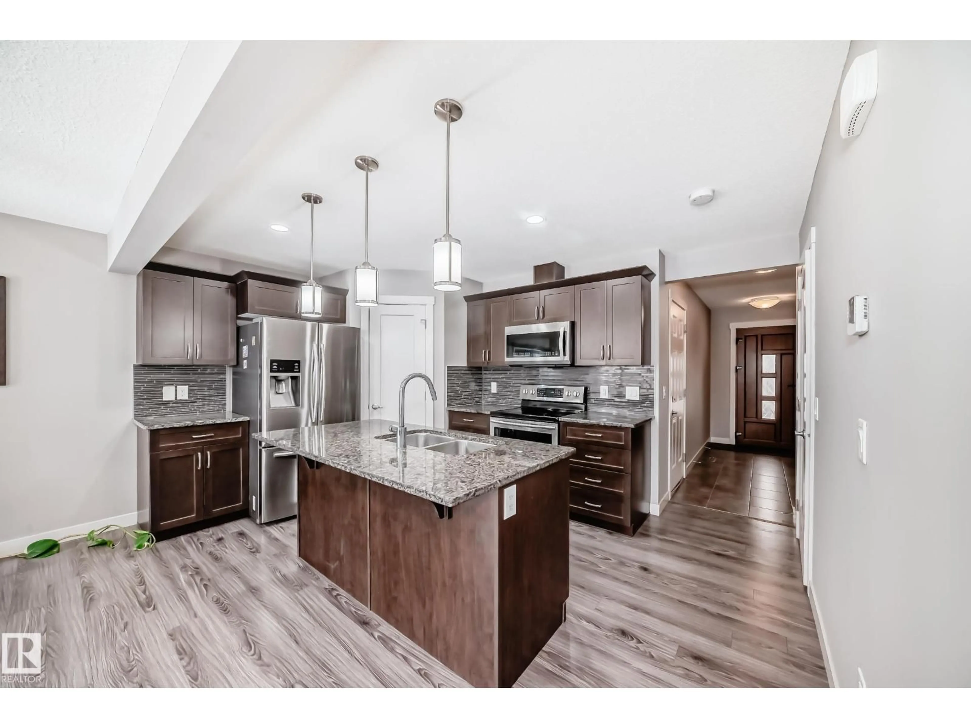 Open concept kitchen, unknown for SW - 1628 167 ST, Edmonton Alberta T6W3C4
