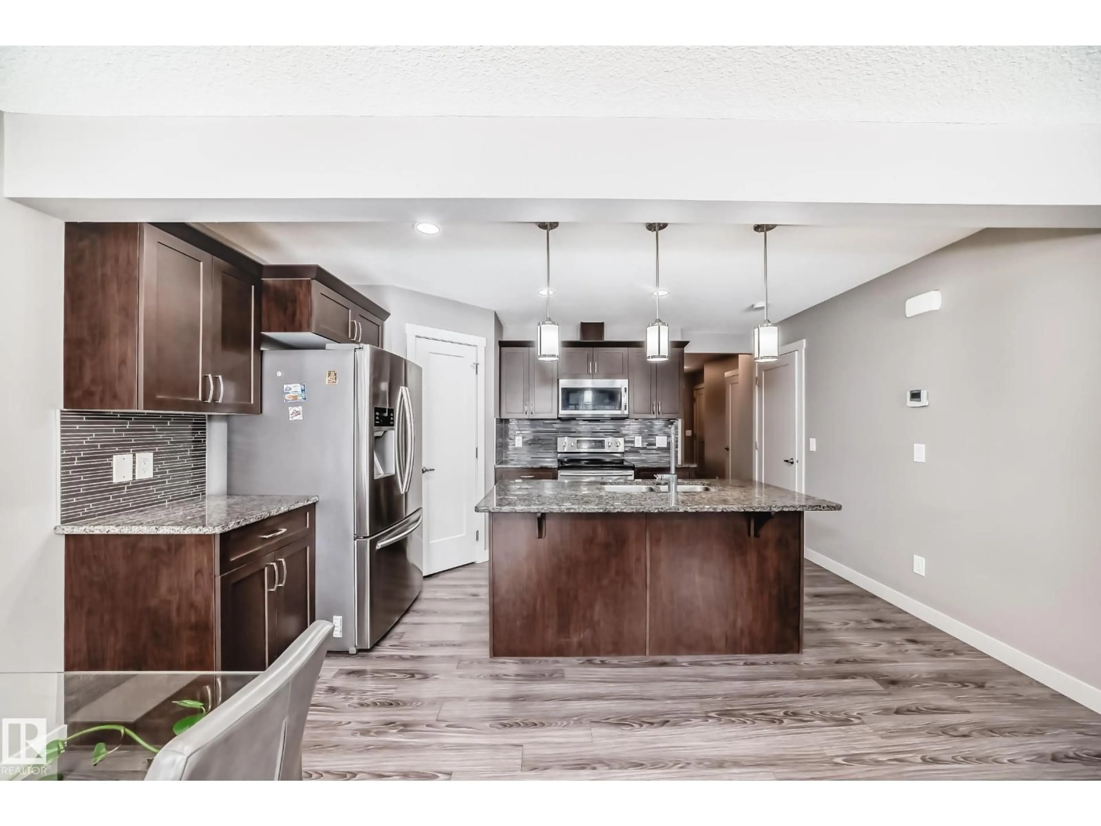 Open concept kitchen, ceramic/tile floor for SW - 1628 167 ST, Edmonton Alberta T6W3C4