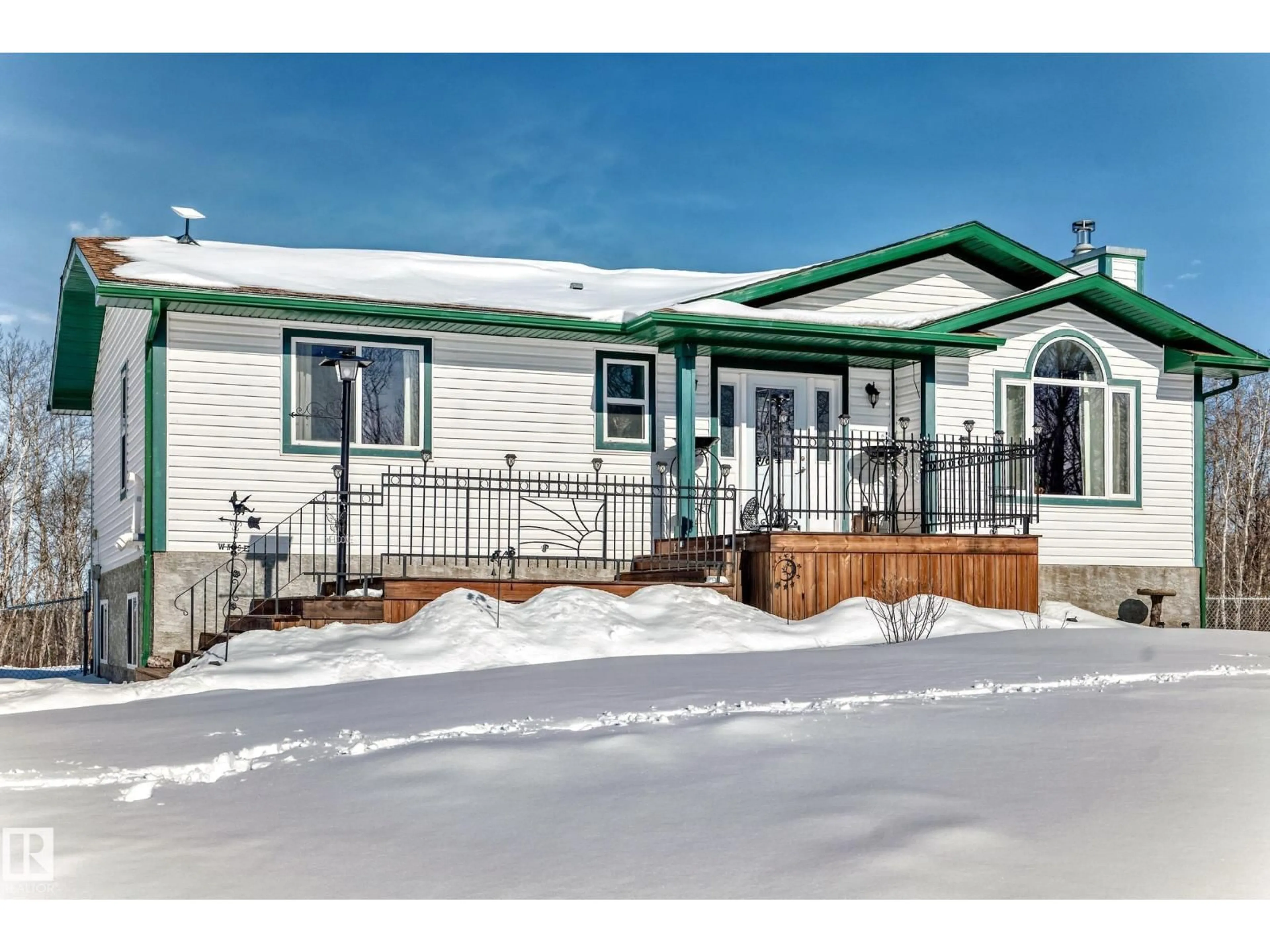 Home with vinyl exterior material, street for 8 54514 RR12, Rural Lac Ste. Anne County Alberta T0E1V2