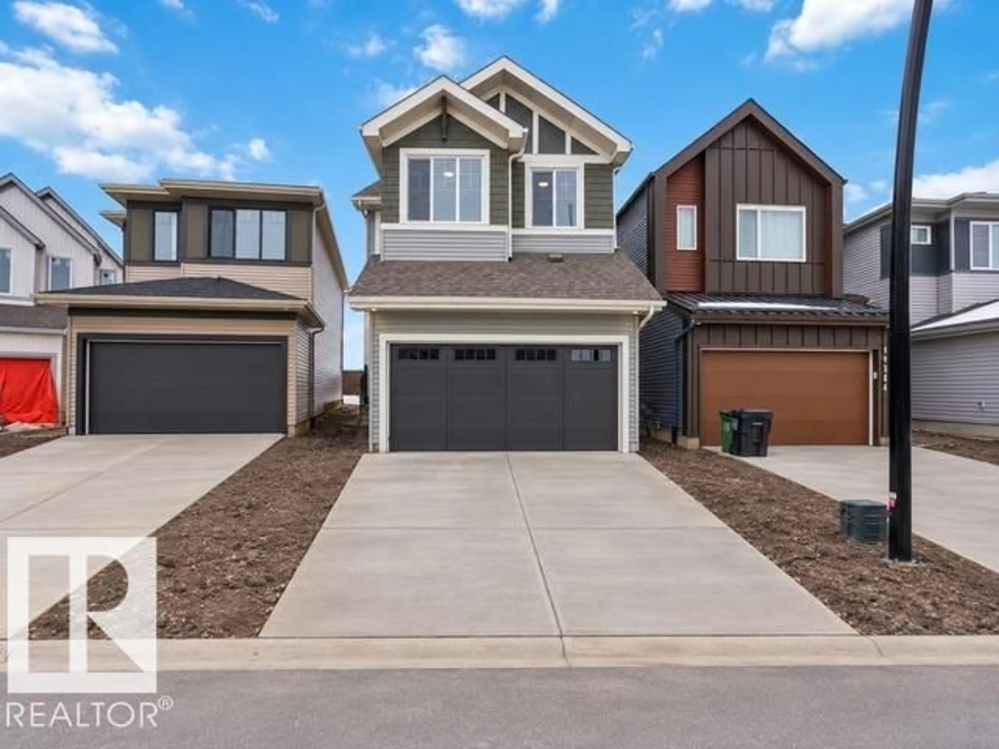 Home with vinyl exterior material, street for 19348 29 AV, Edmonton Alberta T6M3B1