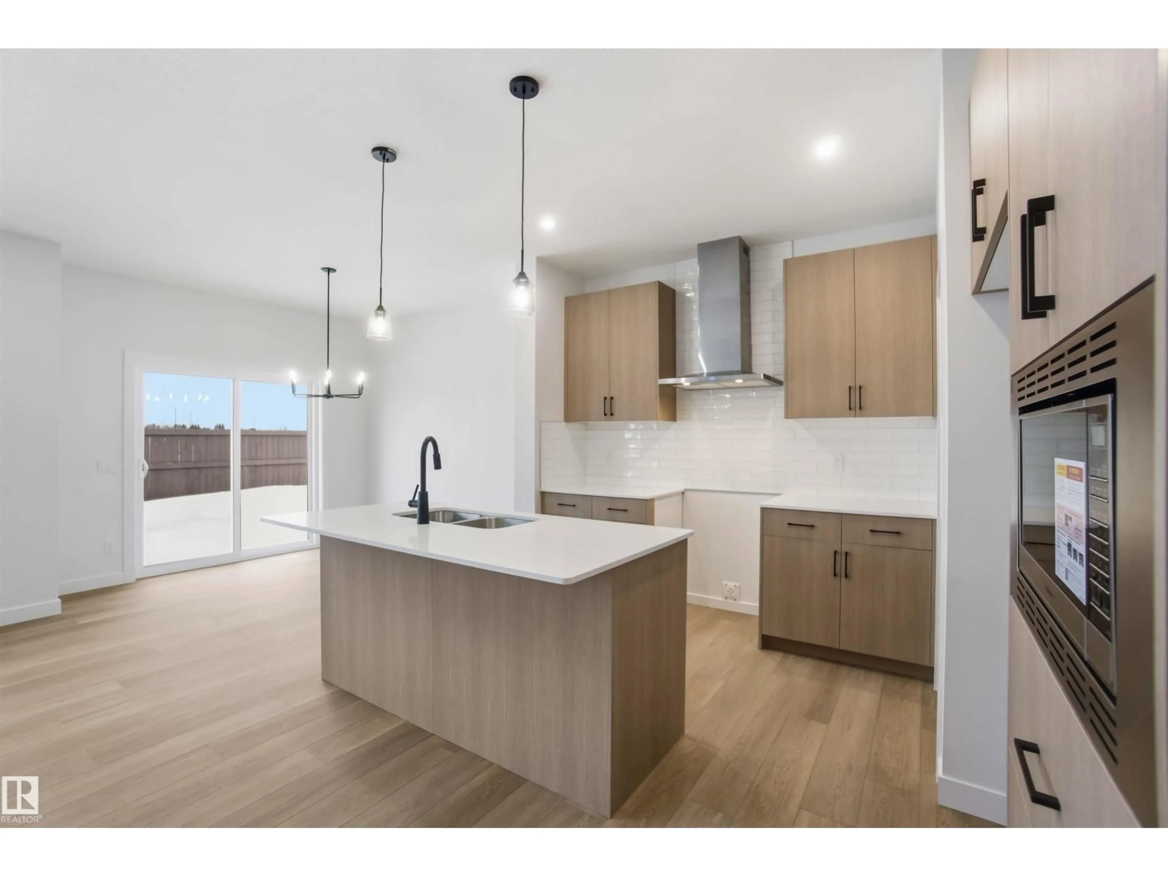 Open concept kitchen, unknown for 19348 29 AV, Edmonton Alberta T6M3B1