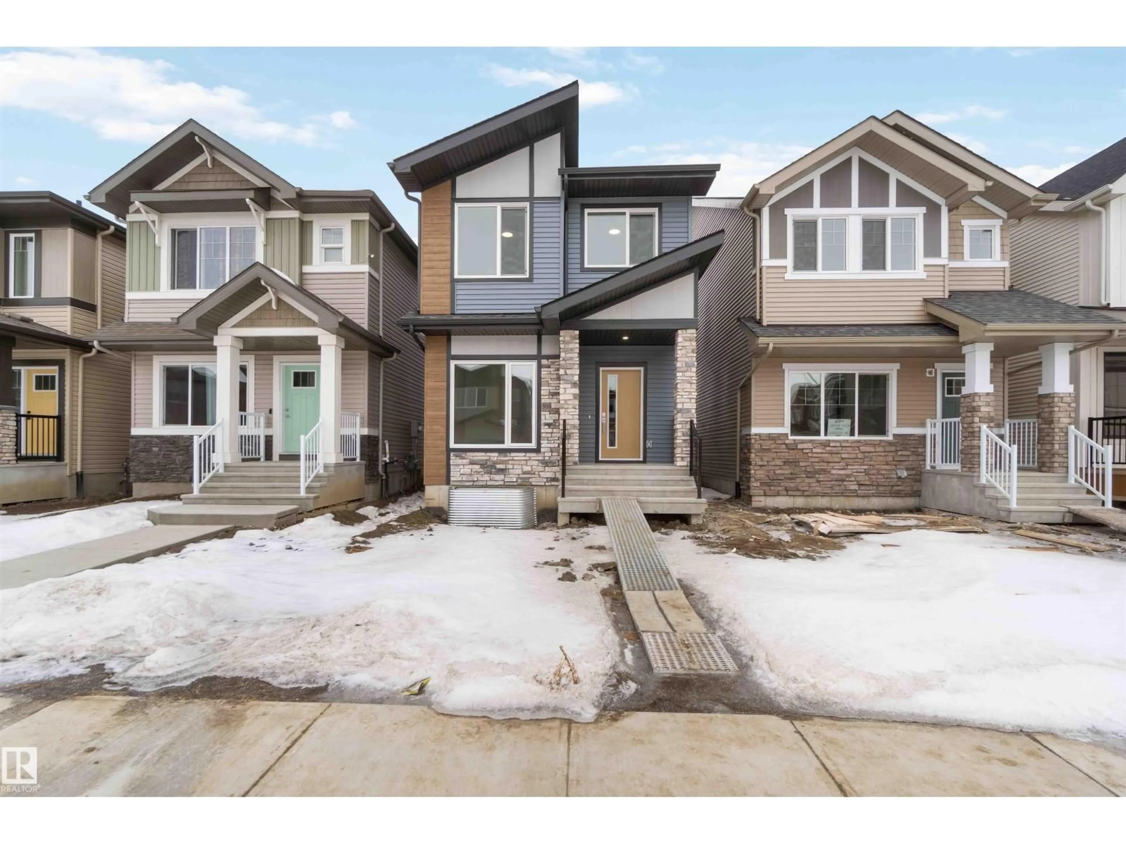 Home with brick exterior material, street for 18912 28 AV, Edmonton Alberta T6M3B1