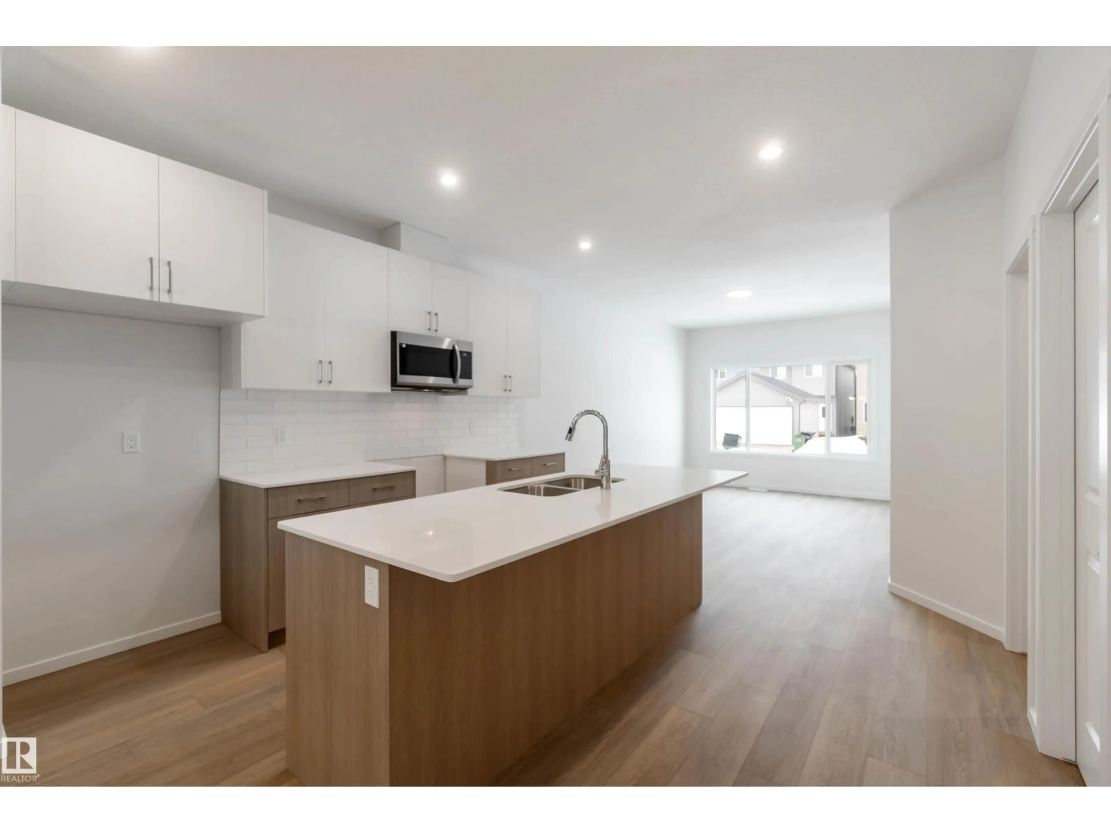 Open concept kitchen, unknown for 18912 28 AV, Edmonton Alberta T6M3B1