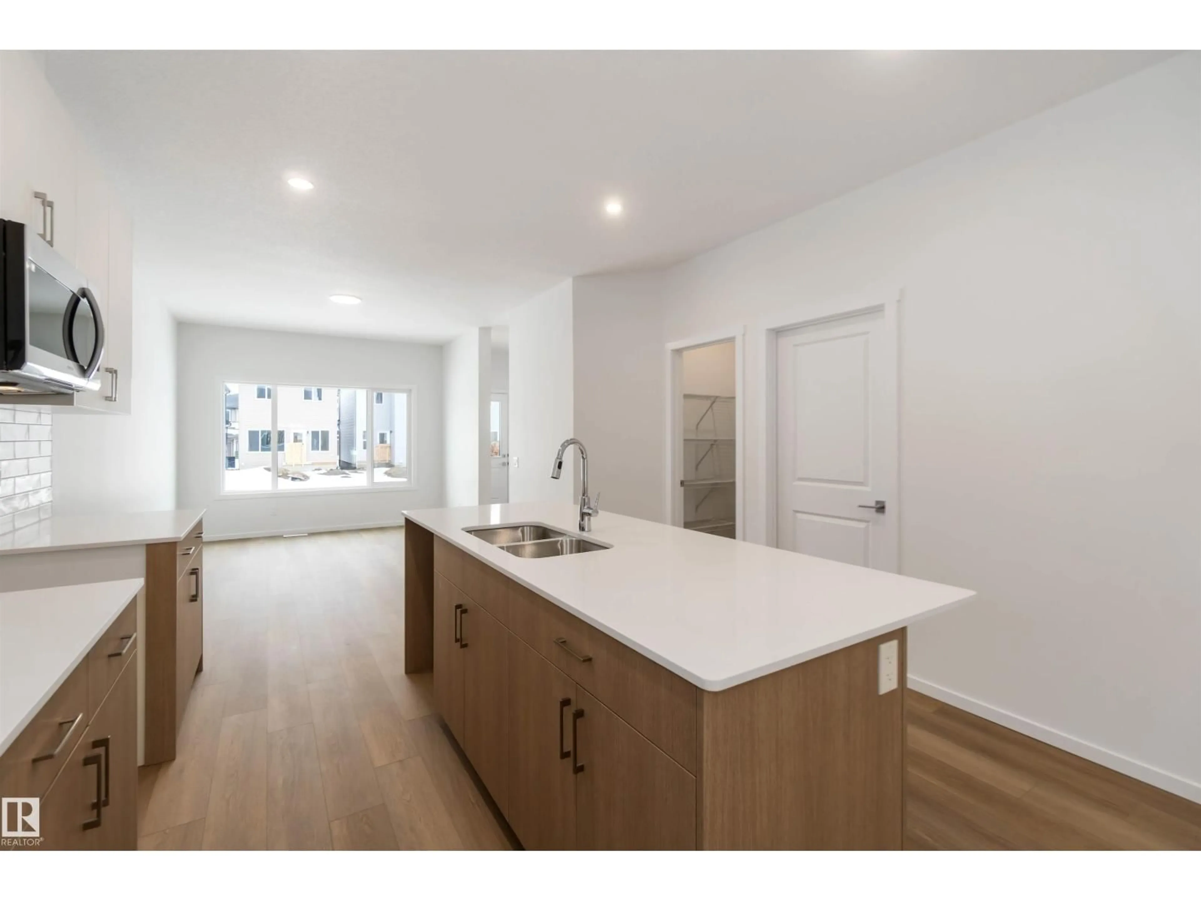 Open concept kitchen, unknown for 18912 28 AV, Edmonton Alberta T6M3B1