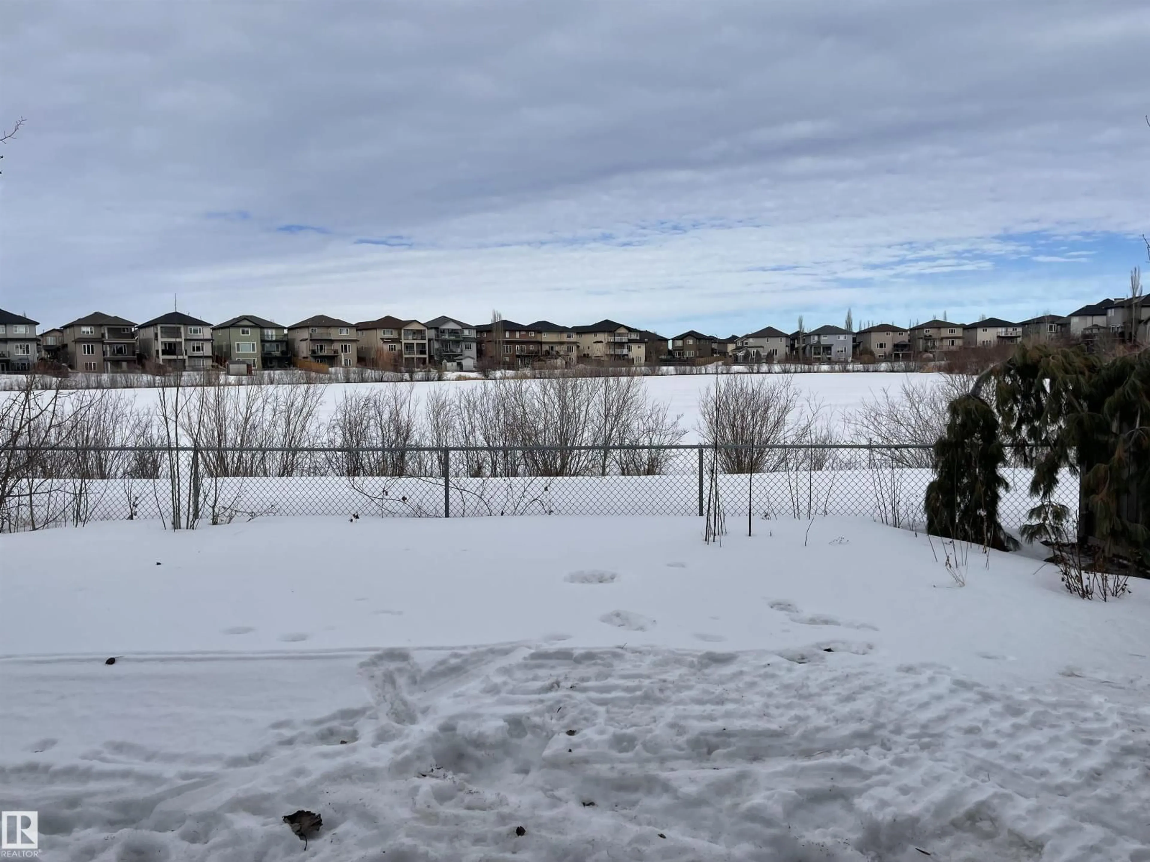 A pic from outside/outdoor area/front of a property/back of a property/a pic from drone, water/lake/river/ocean view for 6116 53 AV, Beaumont Alberta T4X1V6