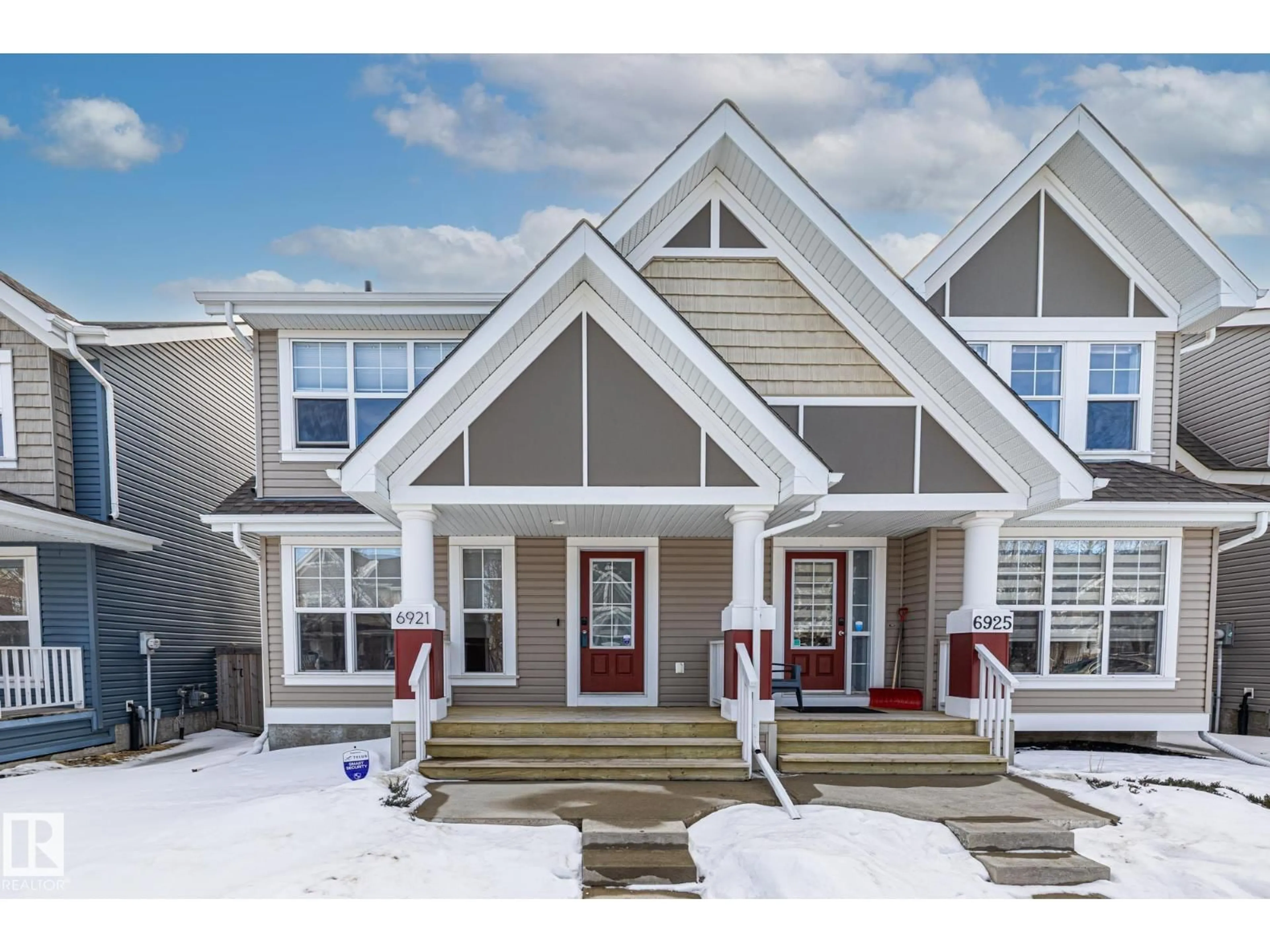 Home with vinyl exterior material, street for 6921 21A AV, Edmonton Alberta T6X0T6