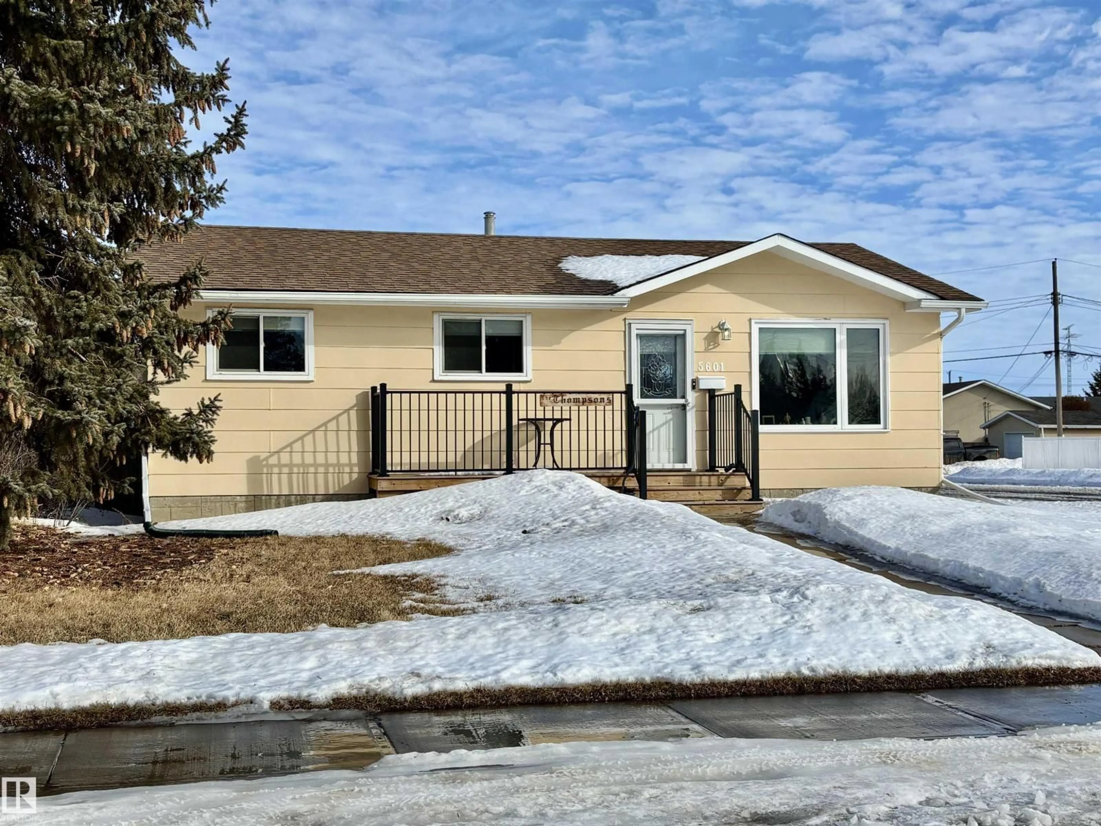 Home with vinyl exterior material, street for 5601 48A ST, Vegreville Alberta T9C1G7