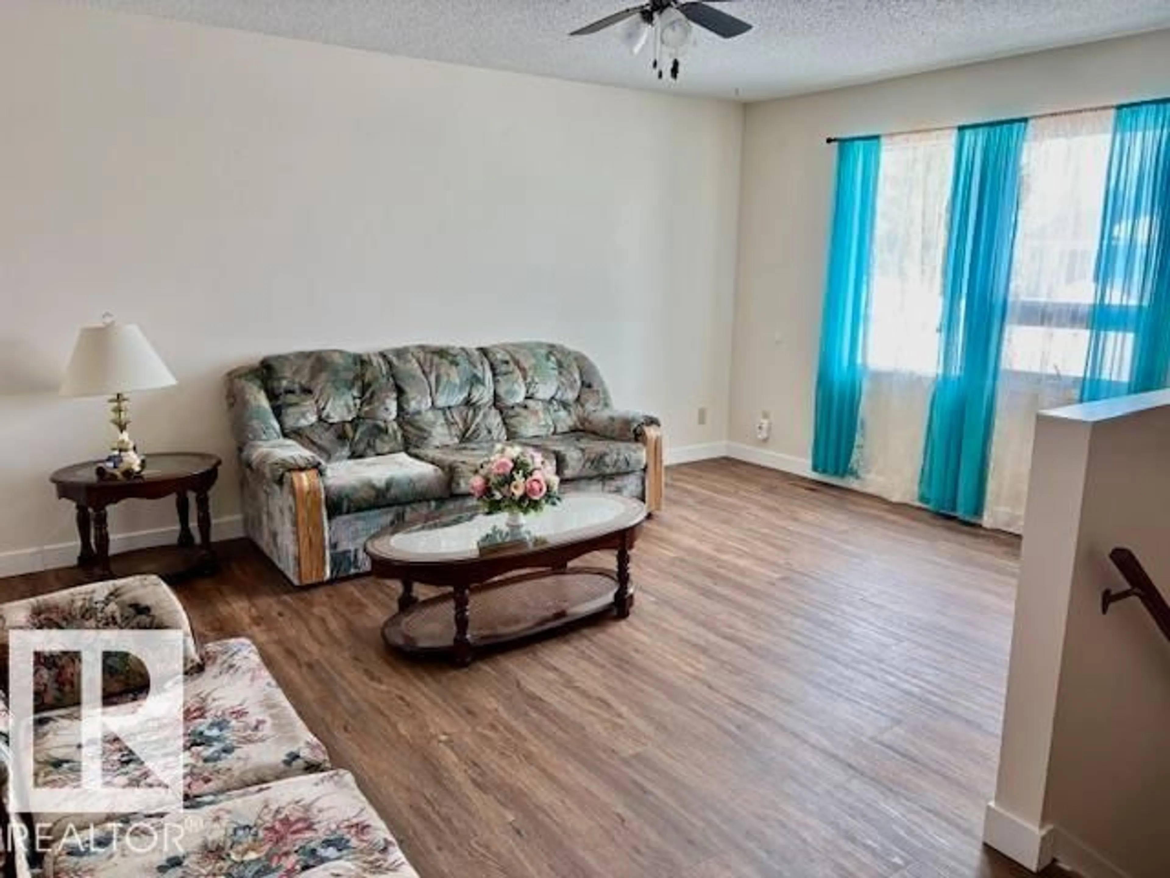 Living room with furniture, unknown for 5622 49 ST, Vegreville Alberta T9C1G6