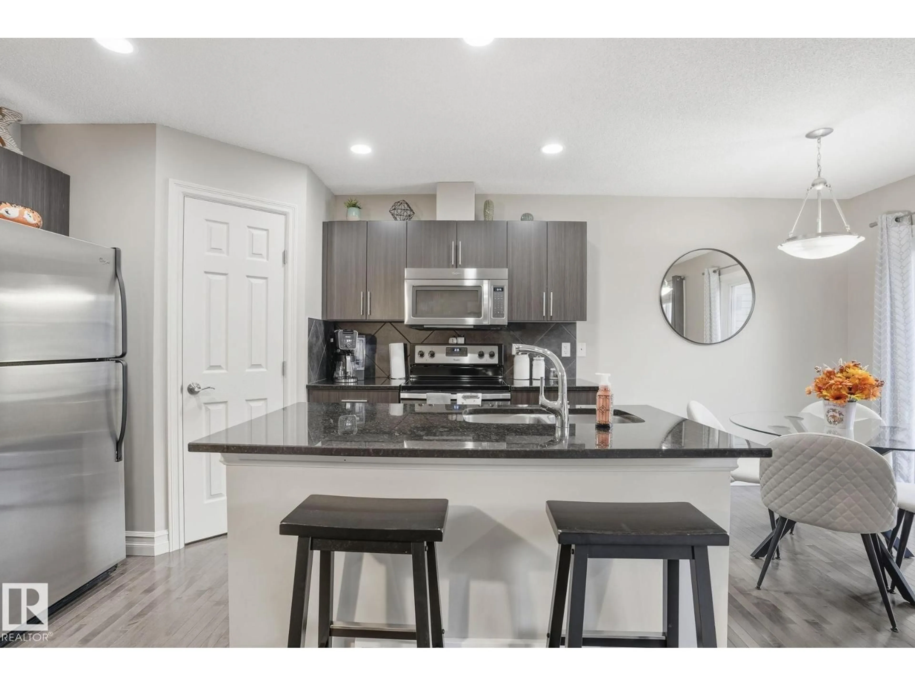 Open concept kitchen, ceramic/tile floor for 12 219 CHARLOTTE WY, Sherwood Park Alberta T8H0T3