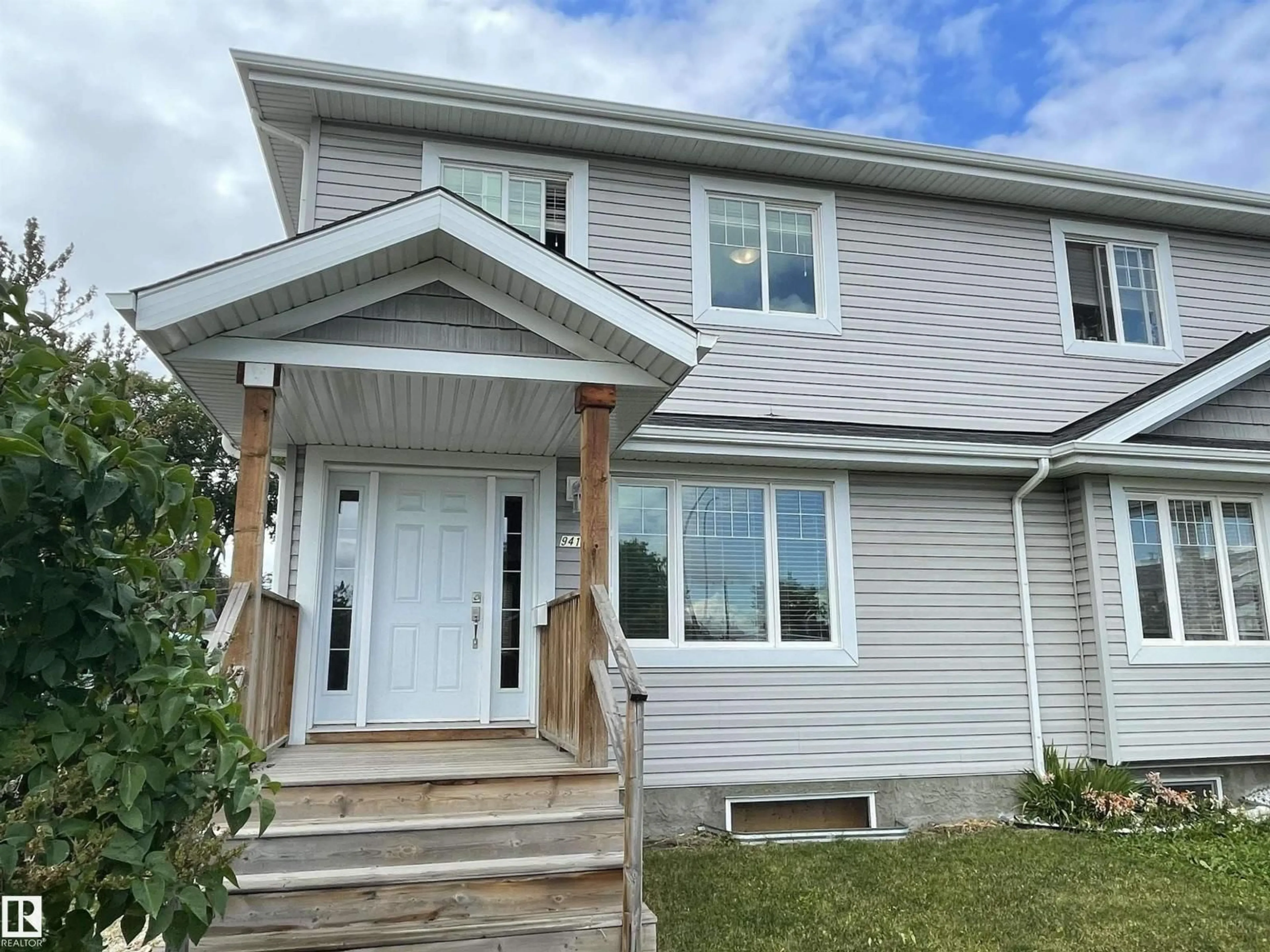 Home with vinyl exterior material, street for NW - 9412 156 ST, Edmonton Alberta T5R1Z4