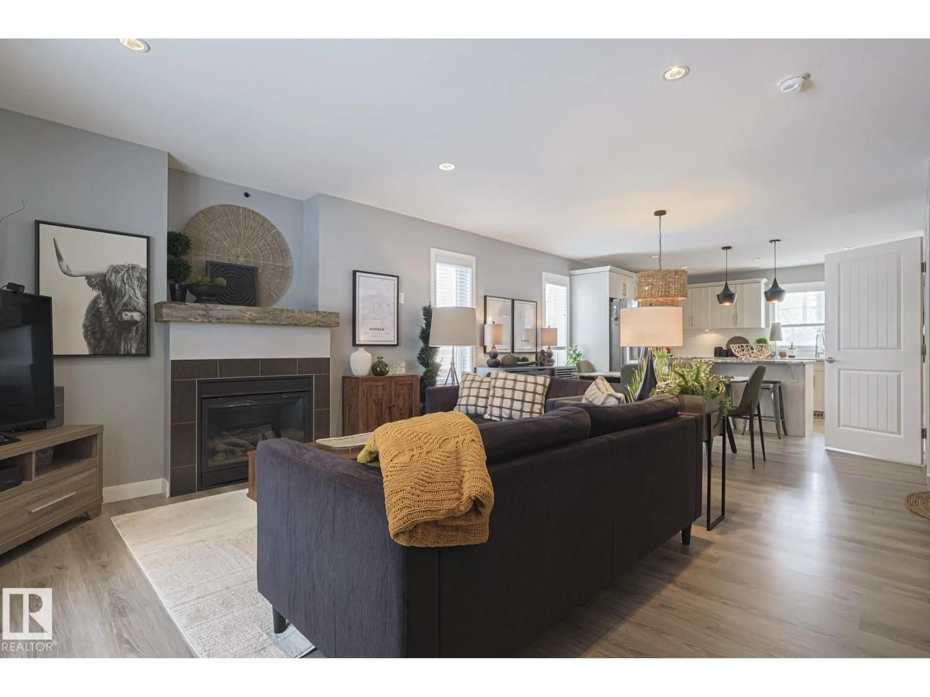 Living room with furniture, unknown for 12209 103 ST NW, Edmonton Alberta T5G2K2