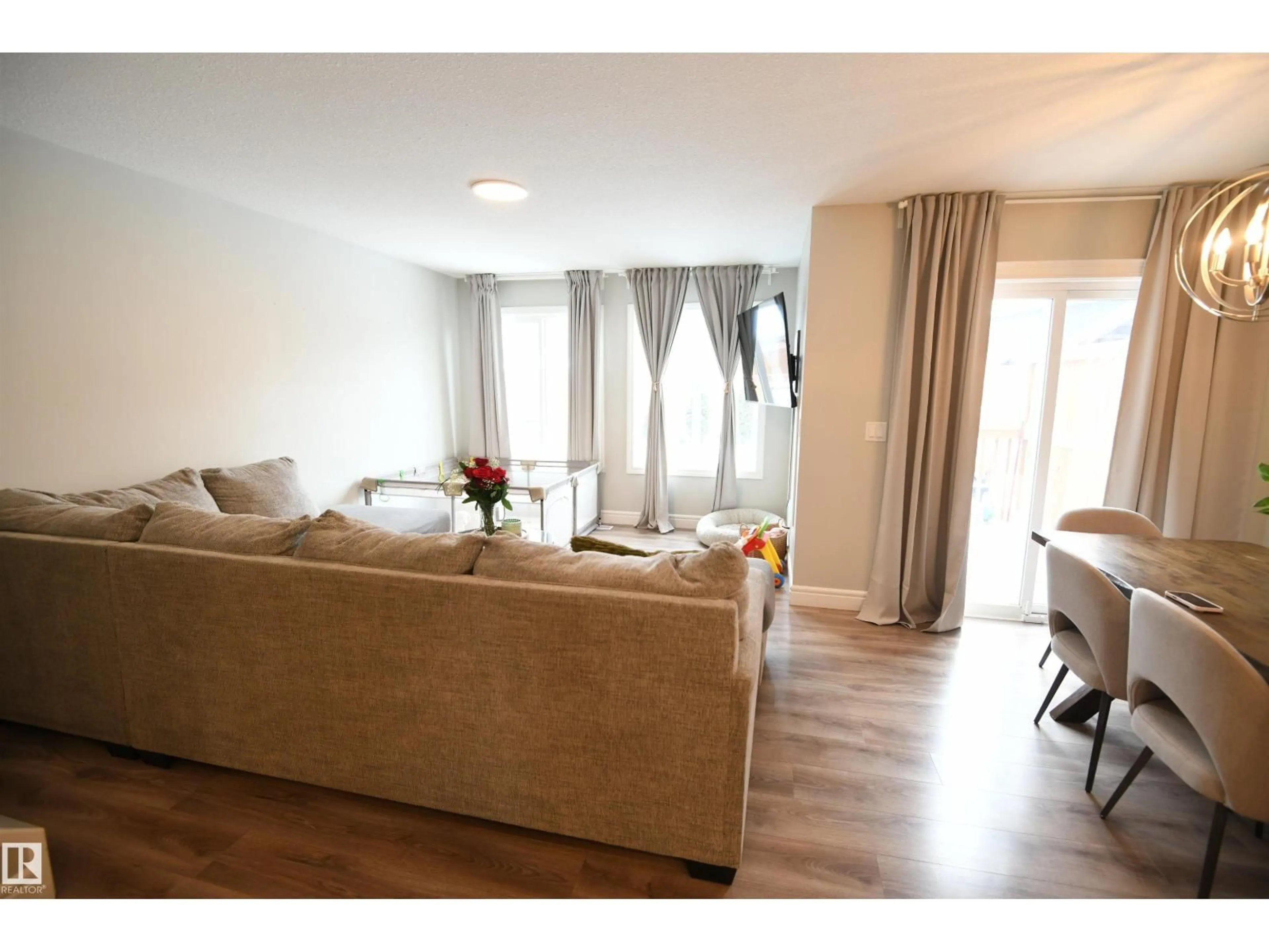 Living room with furniture, wood/laminate floor for 352 SAVOY CR, Sherwood Park Alberta T8H2X2