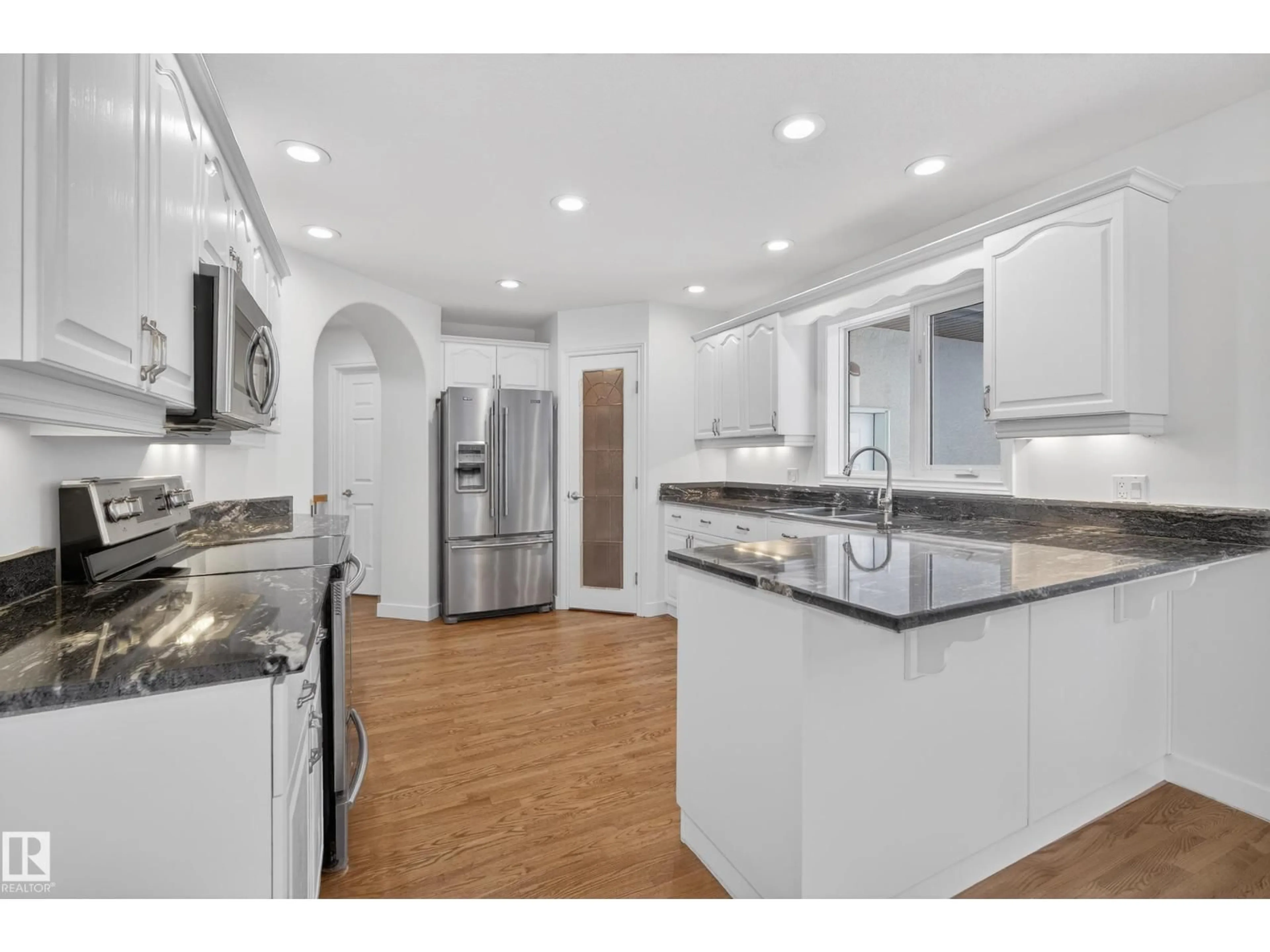 Open concept kitchen, ceramic/tile floor for 19 COUNTRY LN, Stony Plain Alberta T7Z2L1