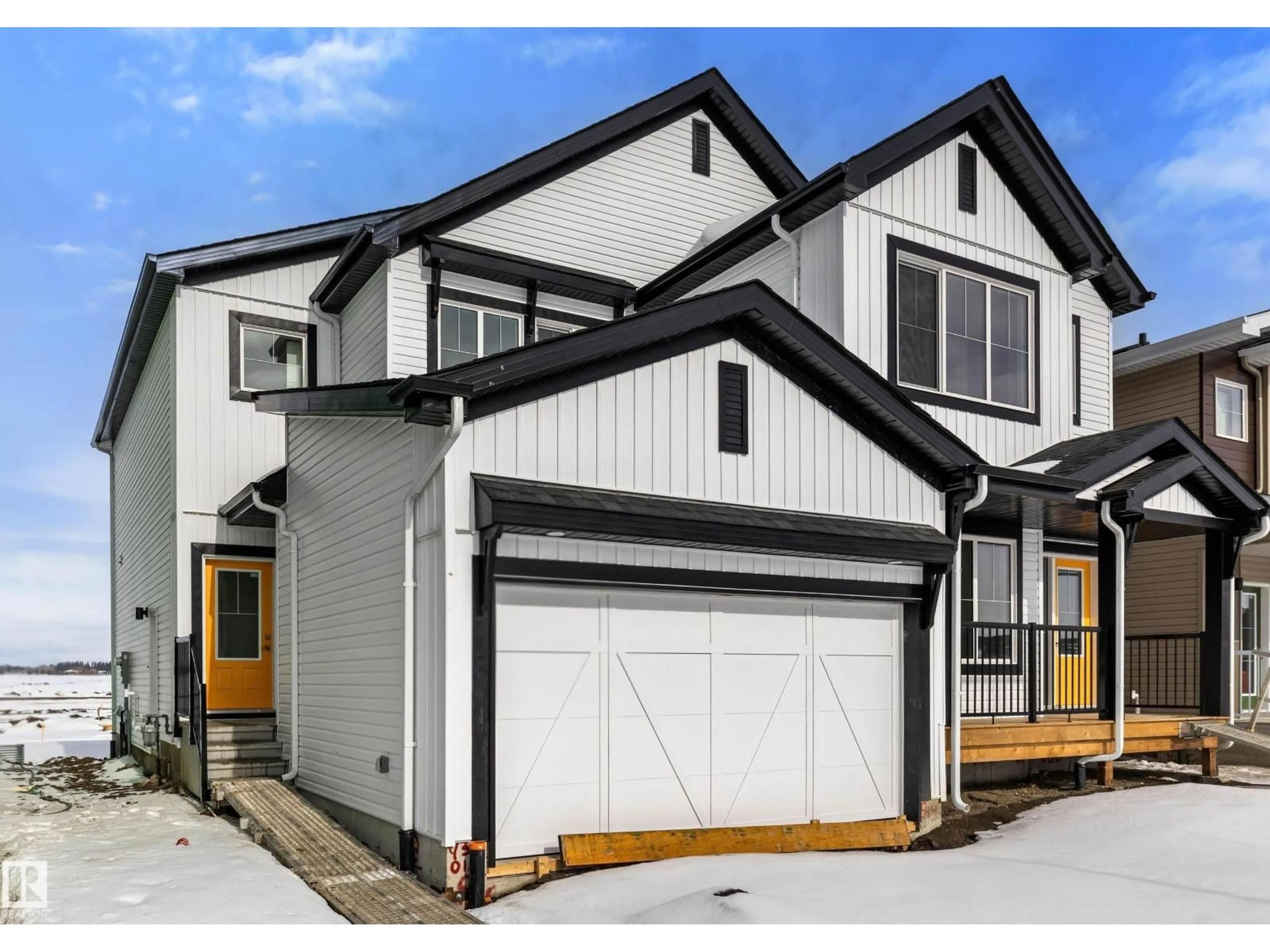 Home with vinyl exterior material, street for NE - 544 176 AV, Edmonton Alberta T5Y4J9
