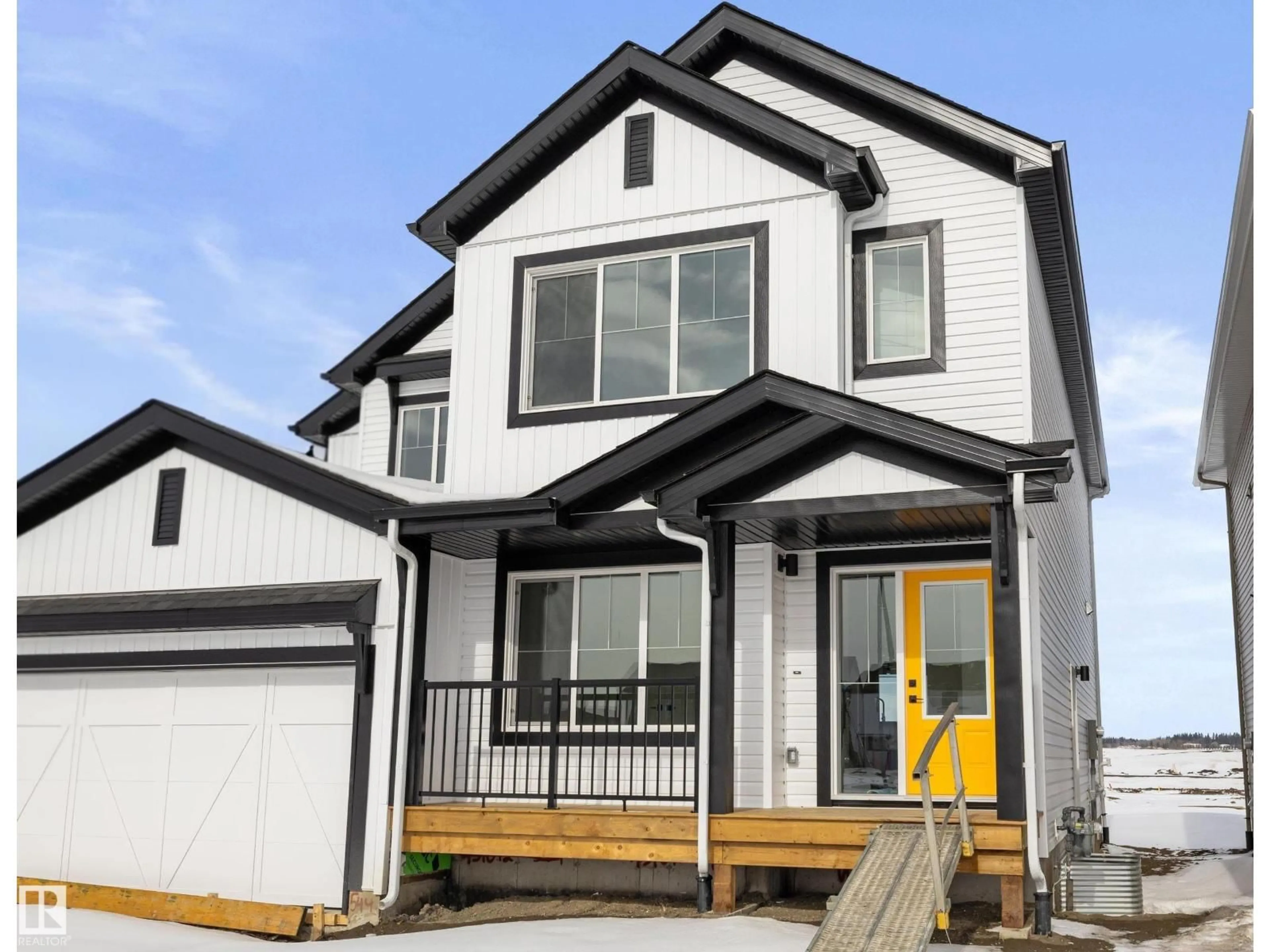 Home with vinyl exterior material, street for NE - 546 176 AV, Edmonton Alberta T5Y4J9