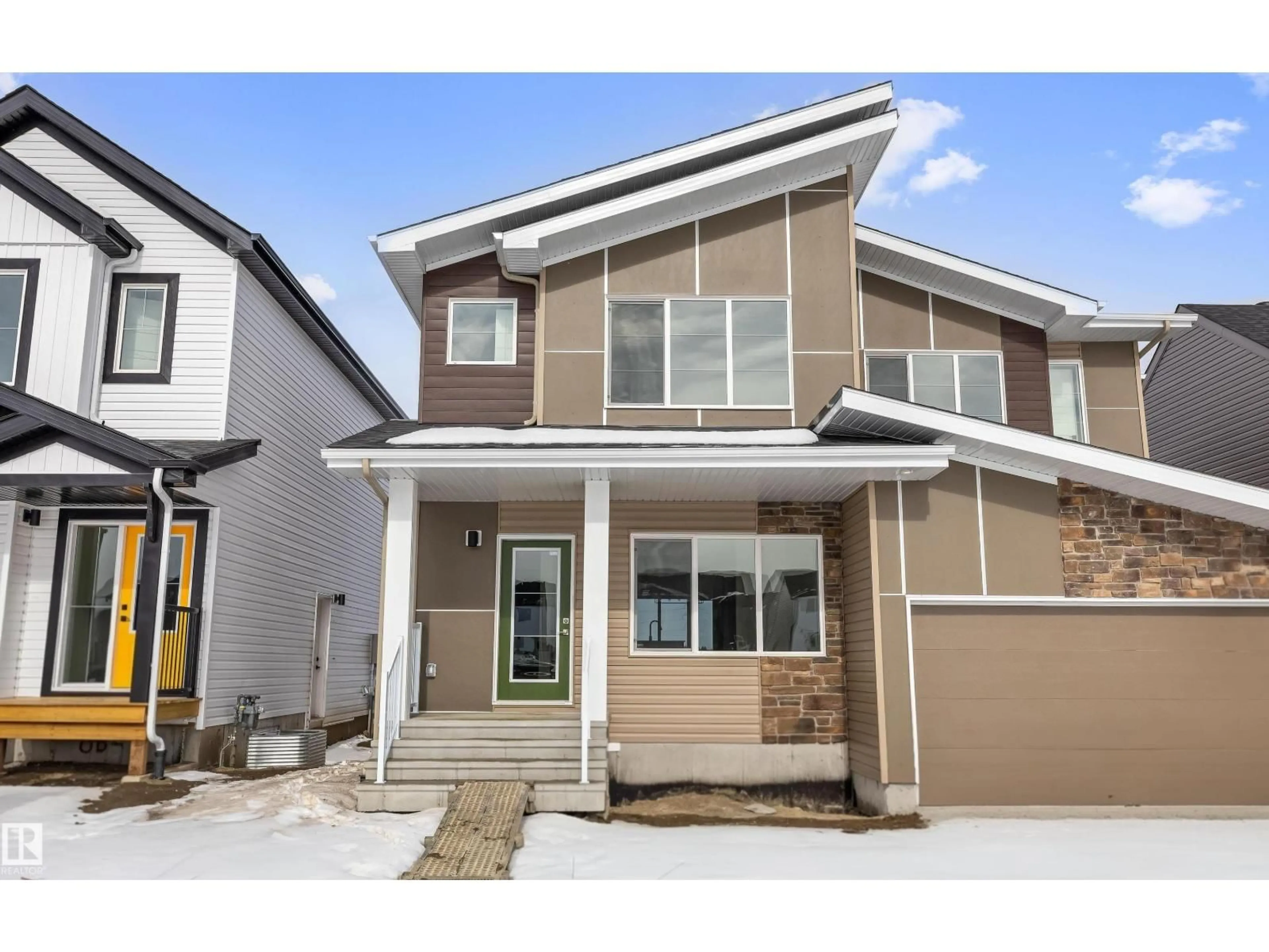 Home with vinyl exterior material, street for NE - 604 176 AV, Edmonton Alberta T5Y4J9