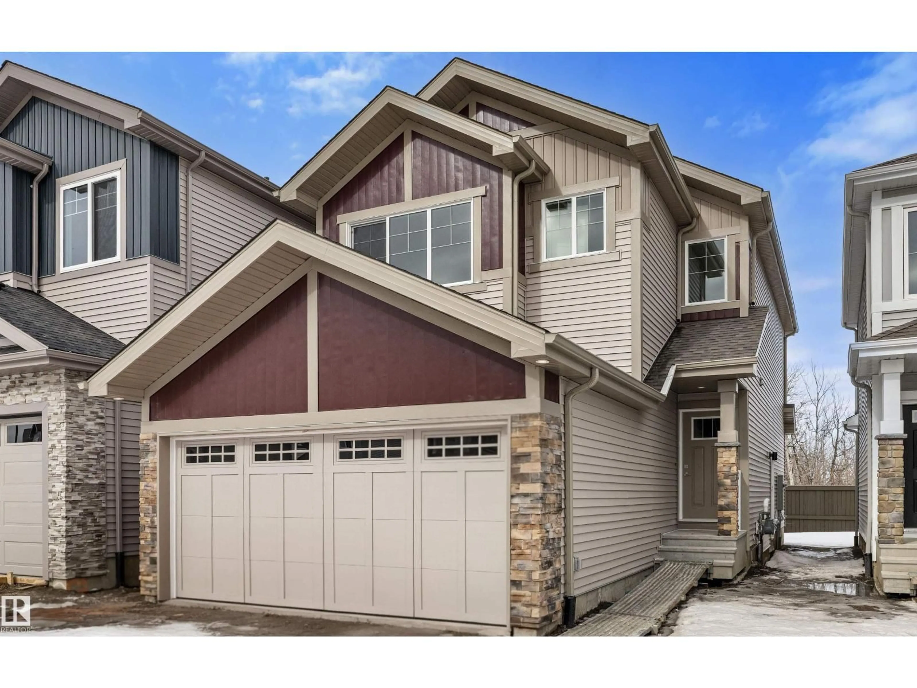 Home with vinyl exterior material, street for NW - 8732 183 AV, Edmonton Alberta T5Z0S8