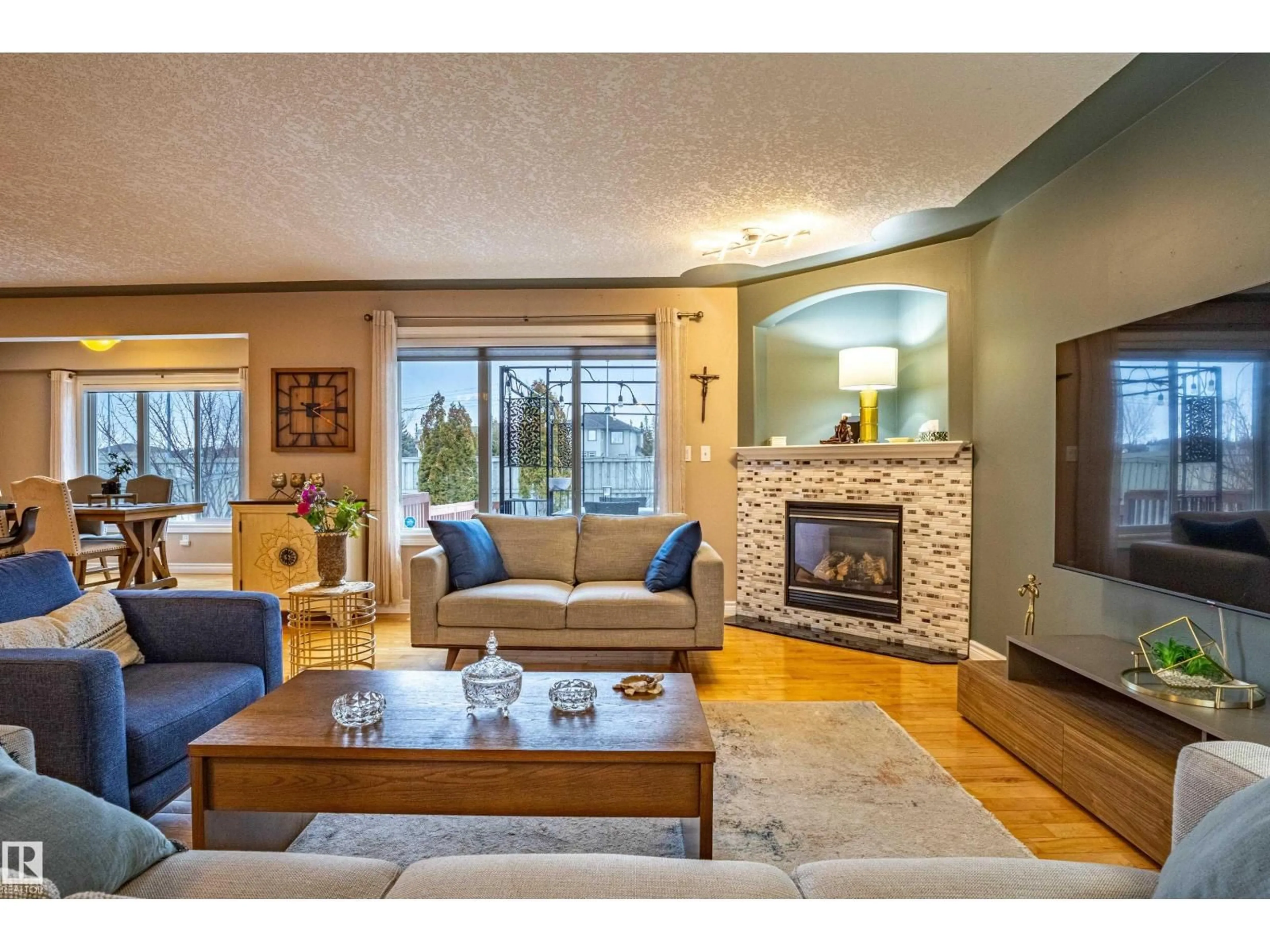 Living room with furniture, wood/laminate floor for 2721 MILES PL, Edmonton Alberta T6W0B3