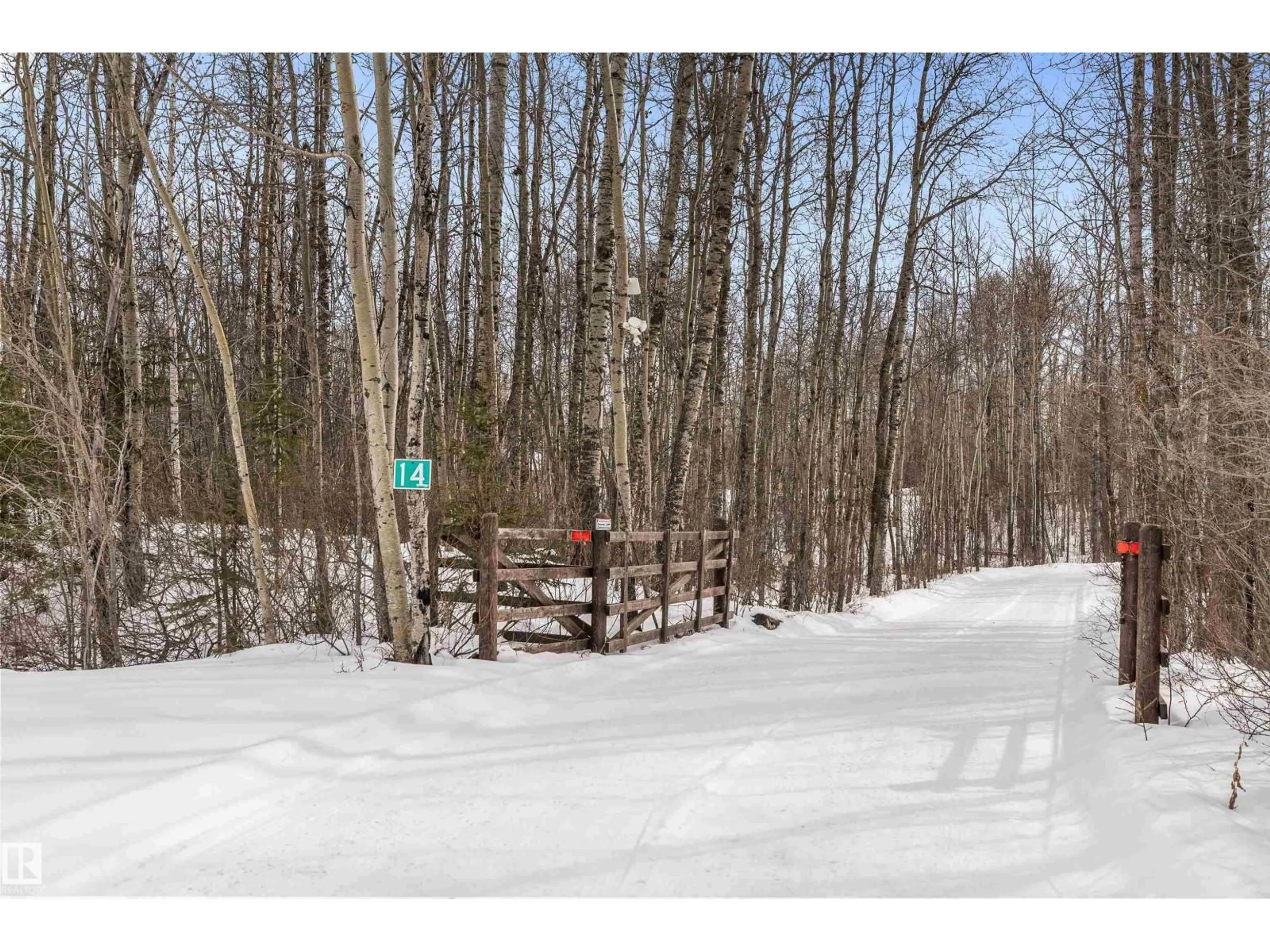 A pic from outside/outdoor area/front of a property/back of a property/a pic from drone, forest/trees view for #14 - 53301 RGE ROAD 32, Rural Parkland County Alberta T7Y0C2