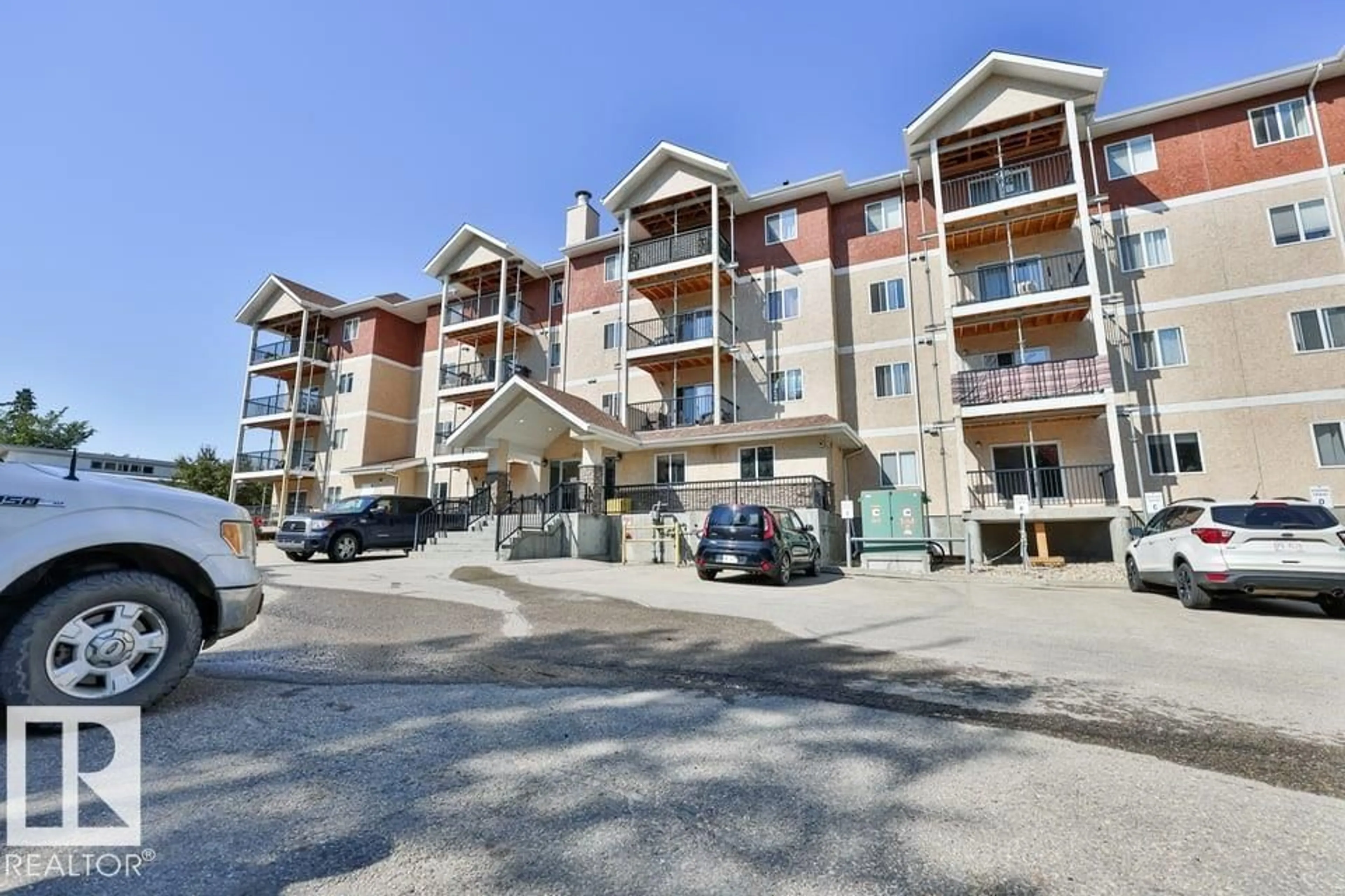 A pic from outside/outdoor area/front of a property/back of a property/a pic from drone, unknown for #107 - 4903 47 AV, Stony Plain Alberta T7Z0C6