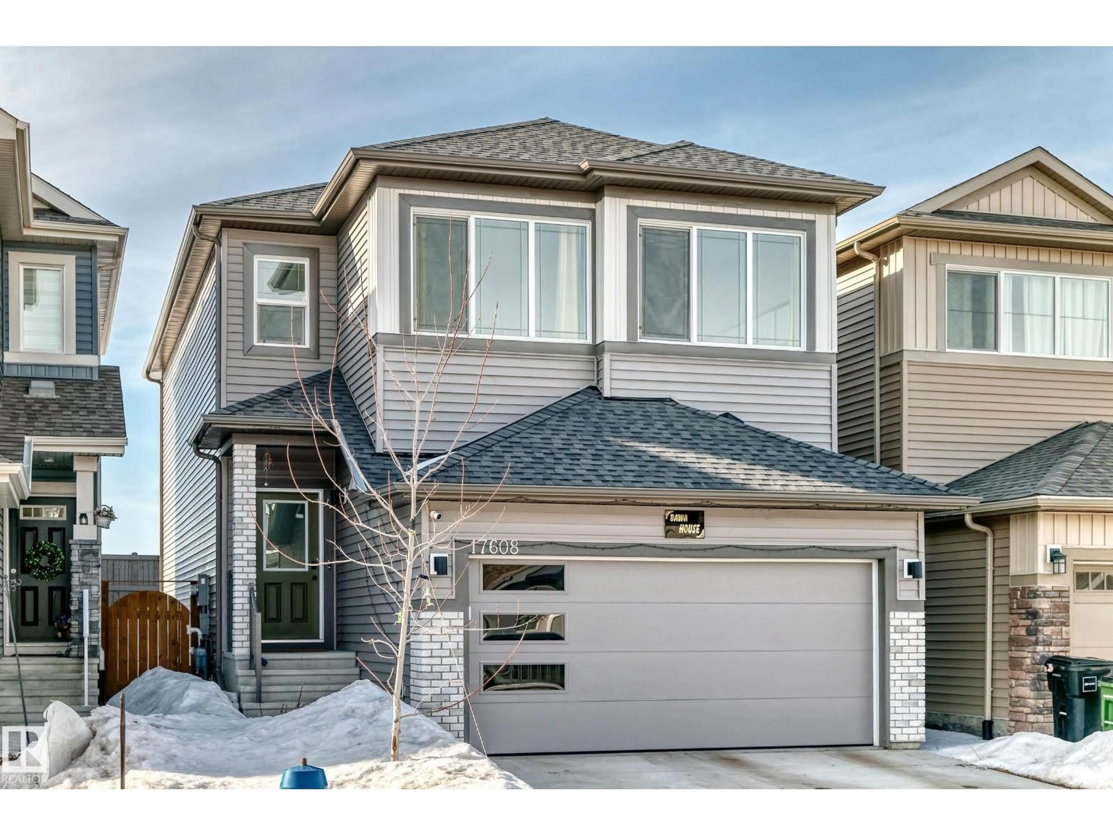 Home with vinyl exterior material, street for 17608 49 ST, Edmonton Alberta T5Y4C6