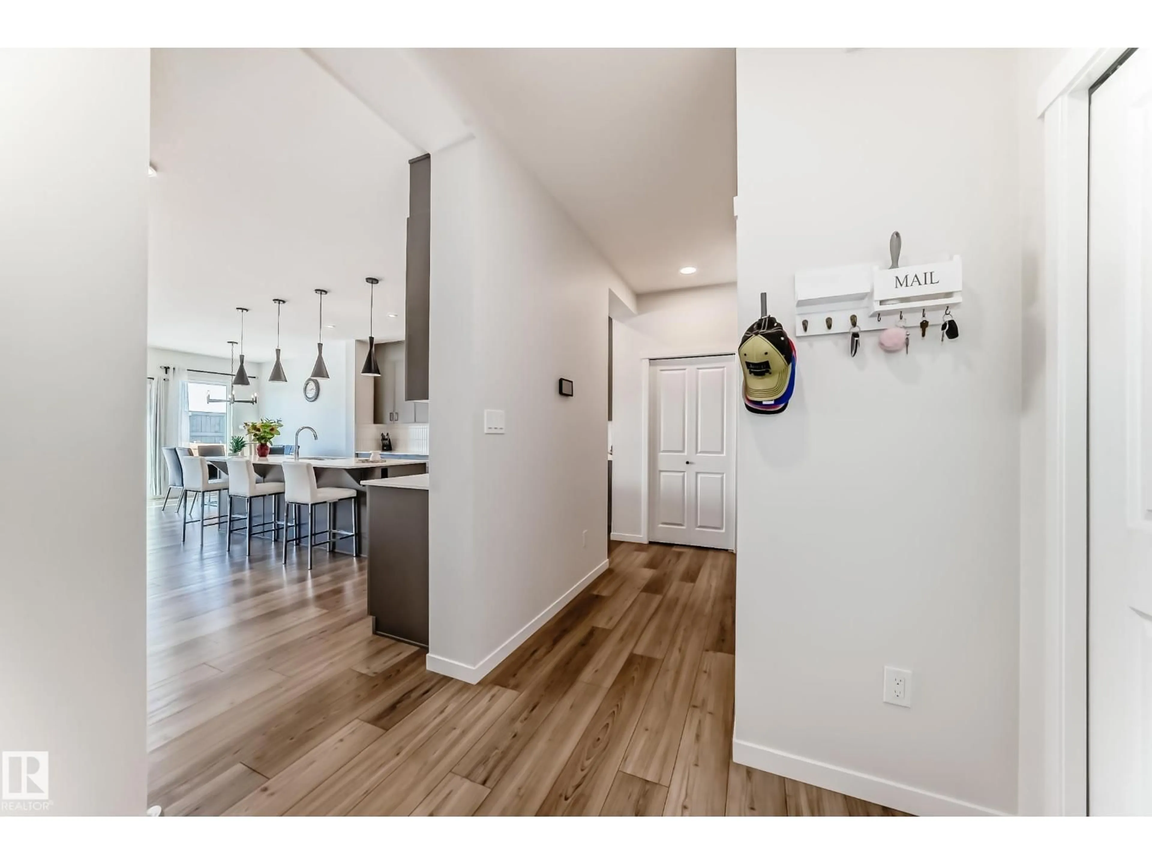 Open concept kitchen, wood/laminate floor for 17608 49 ST, Edmonton Alberta T5Y4C6