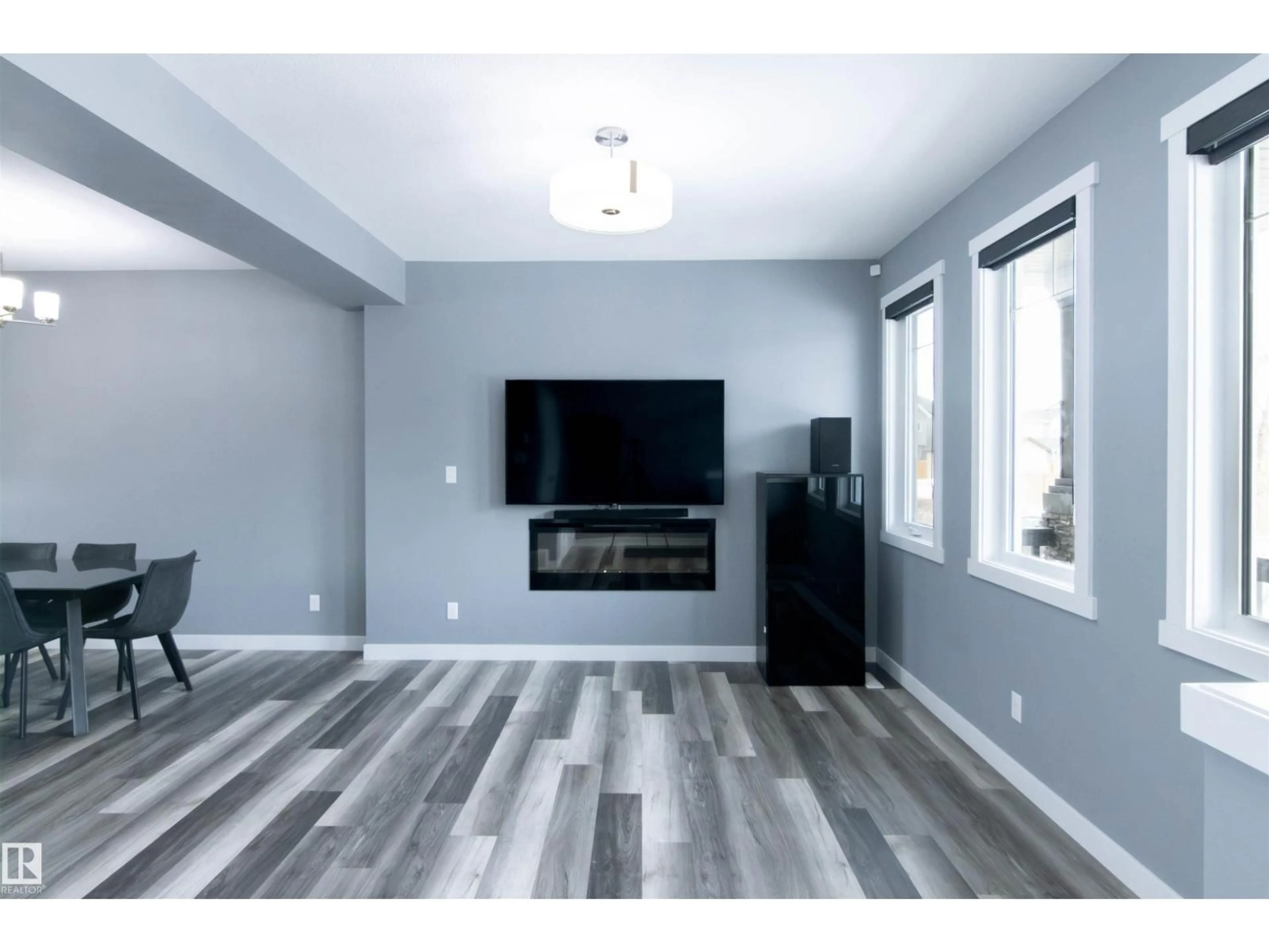 Living room with furniture, wood/laminate floor for 22603 98 AV, Edmonton Alberta T5T7M4