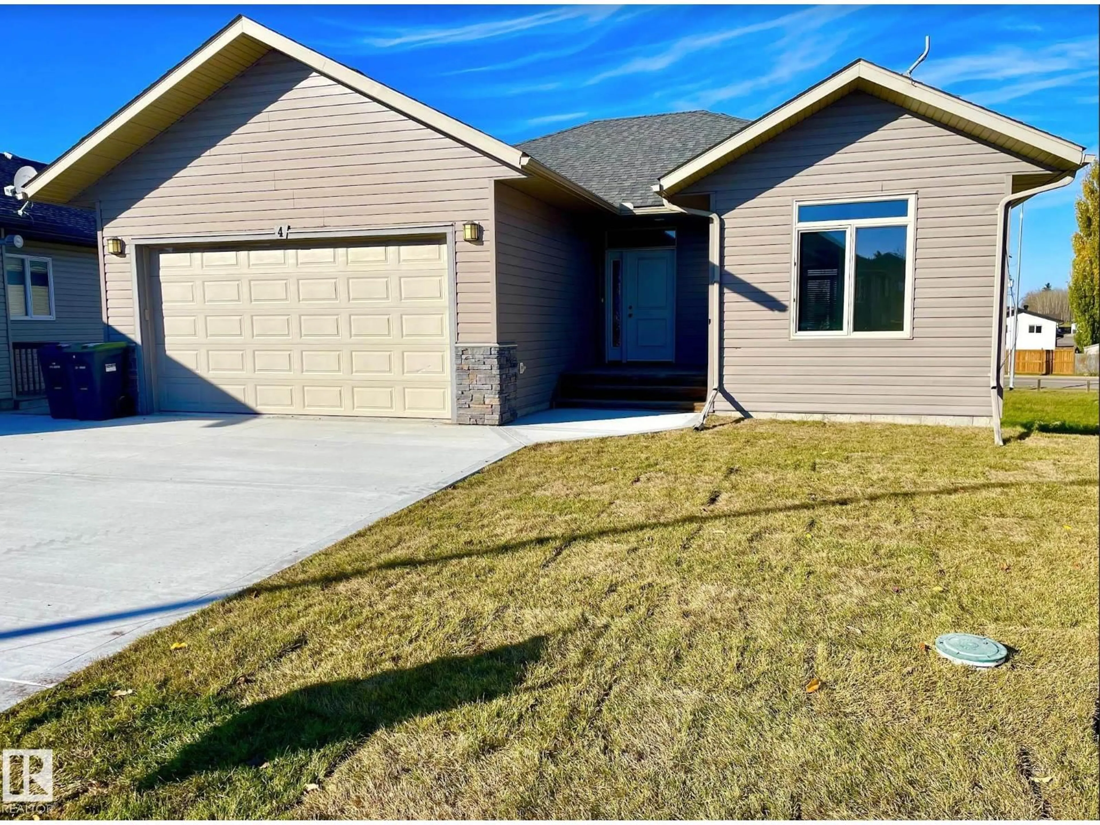 Home with vinyl exterior material, street for 4 ASPEN, Cold Lake Alberta T9M0G2