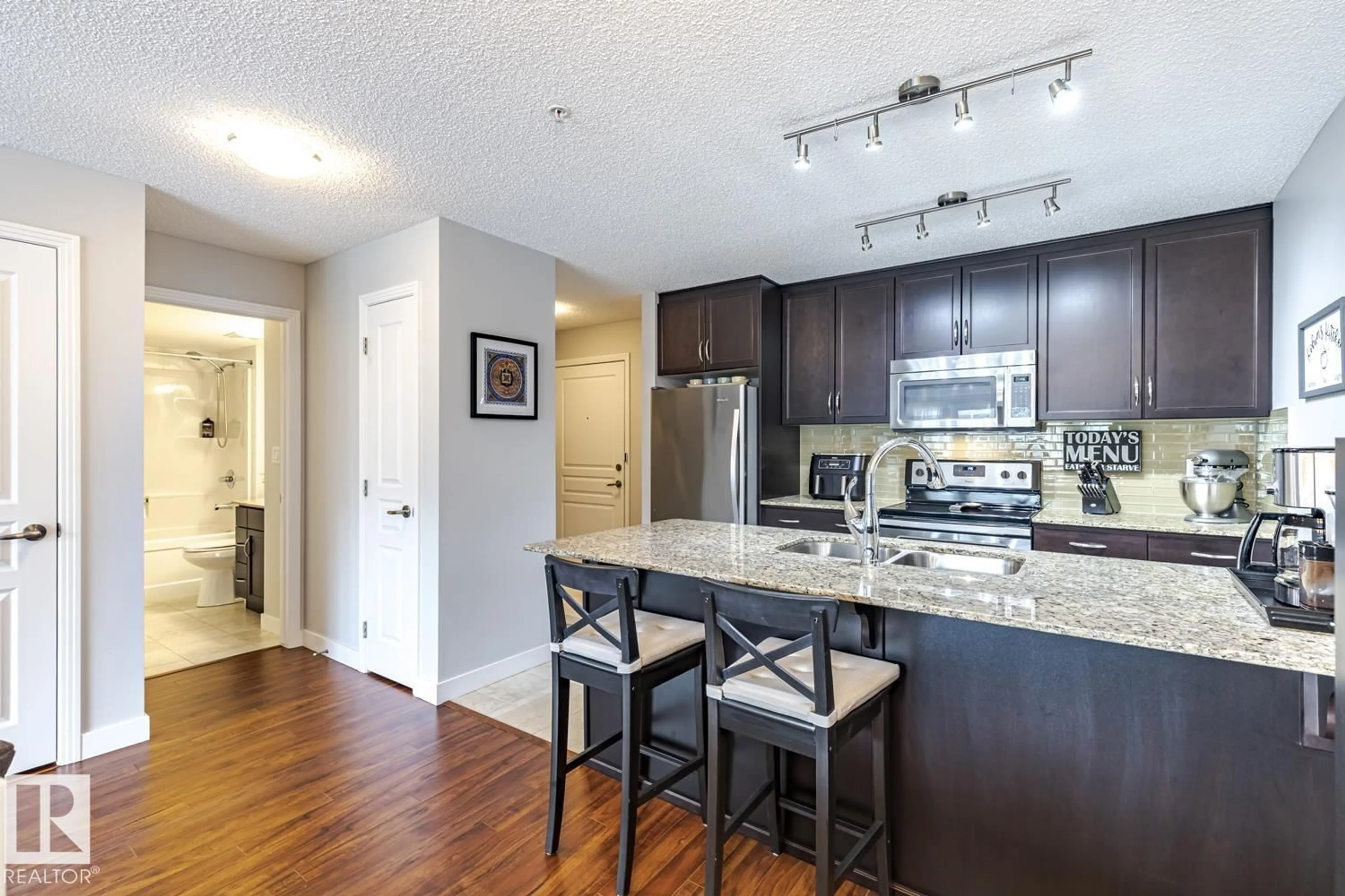Open concept kitchen, unknown for #221 - 7021 SOUTH TERWILLEGAR DR, Edmonton Alberta T6R0W5