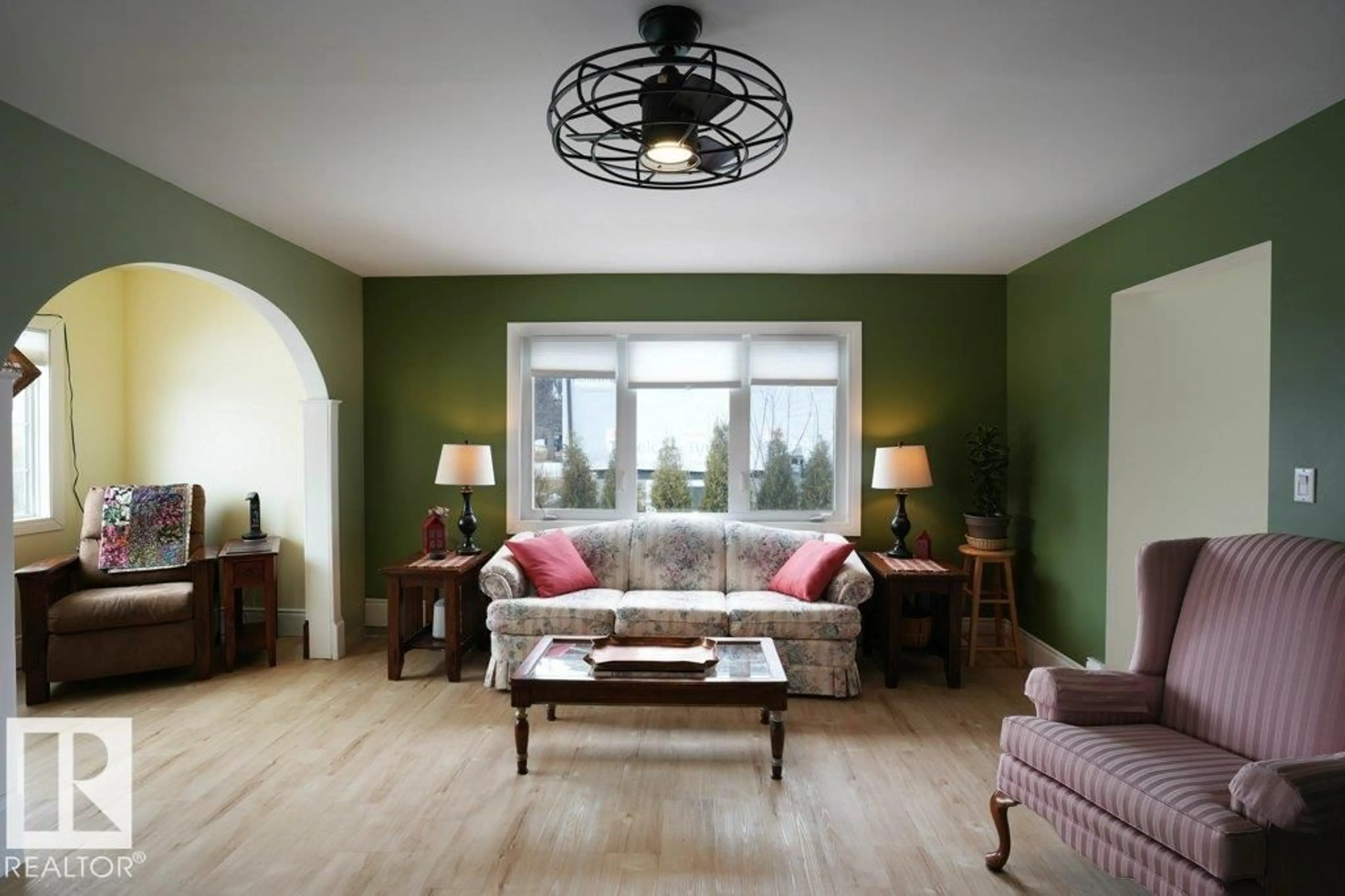 Living room with furniture, wood/laminate floor for 5016 52 AV, Warburg Alberta T0C2T0