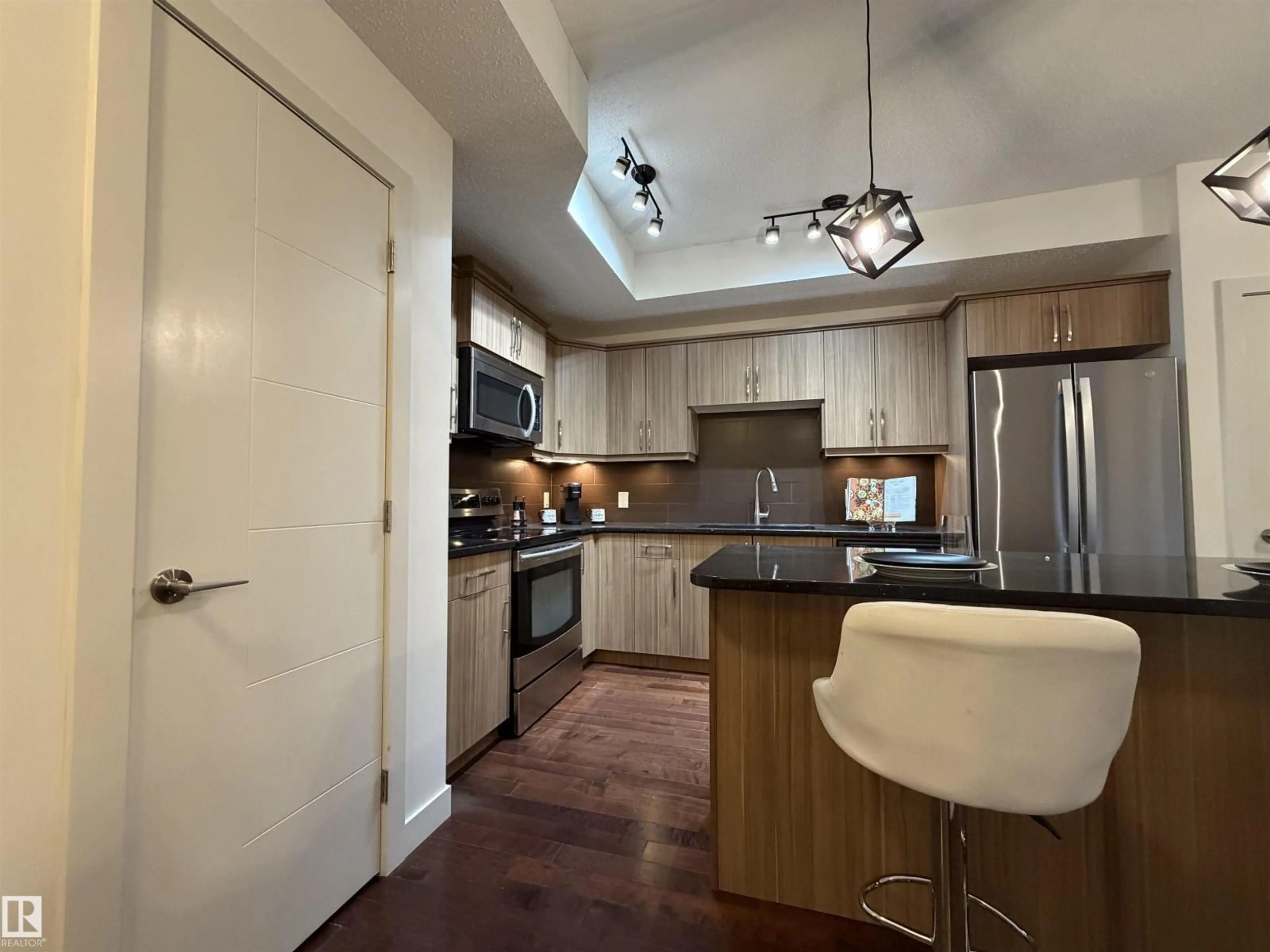 Open concept kitchen, unknown for #115 - 10523 123 ST, Edmonton Alberta T5N1N9