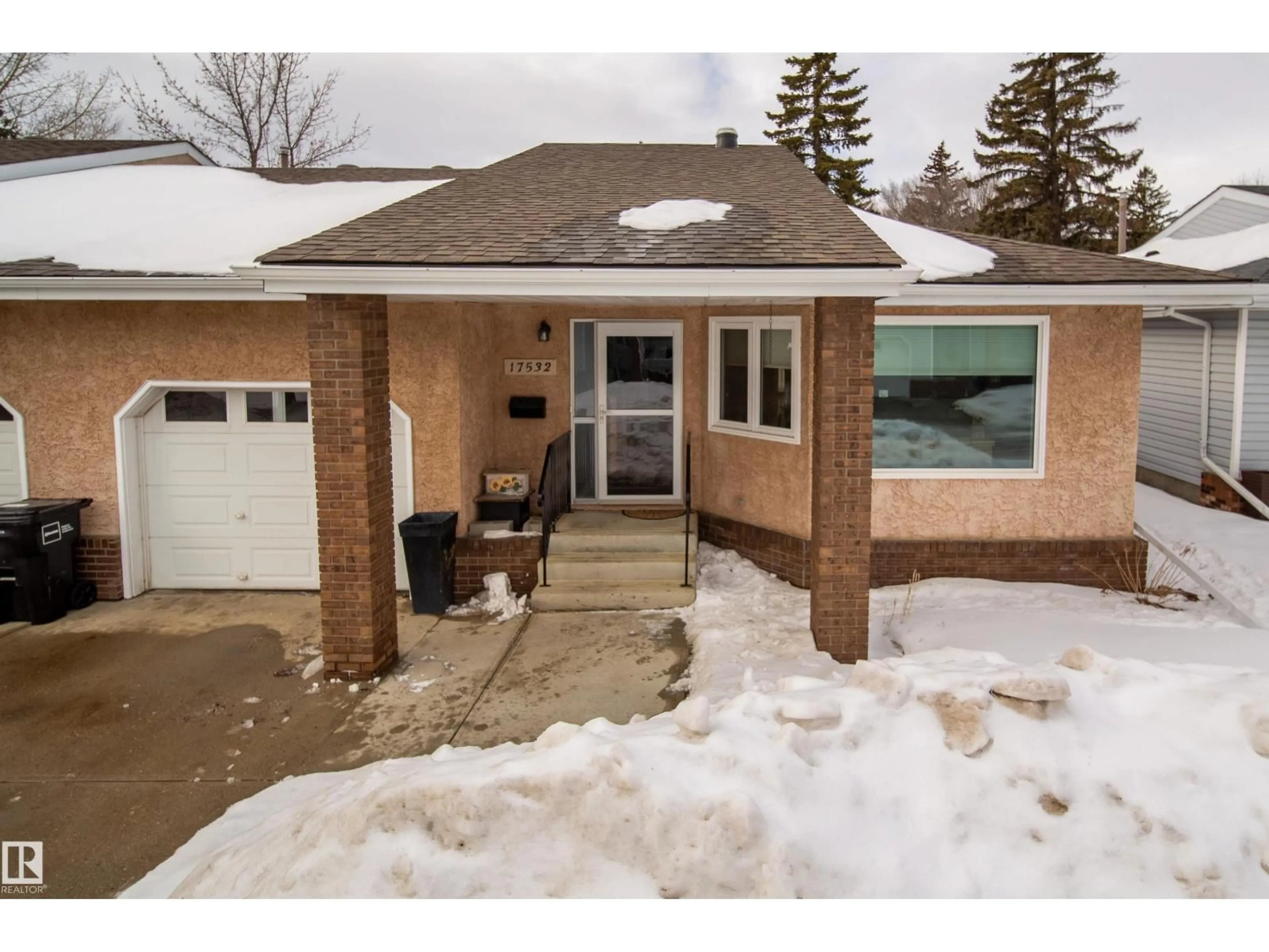 Home with brick exterior material, street for 17532 CALLINGWOOD RD, Edmonton Alberta T5T5P1