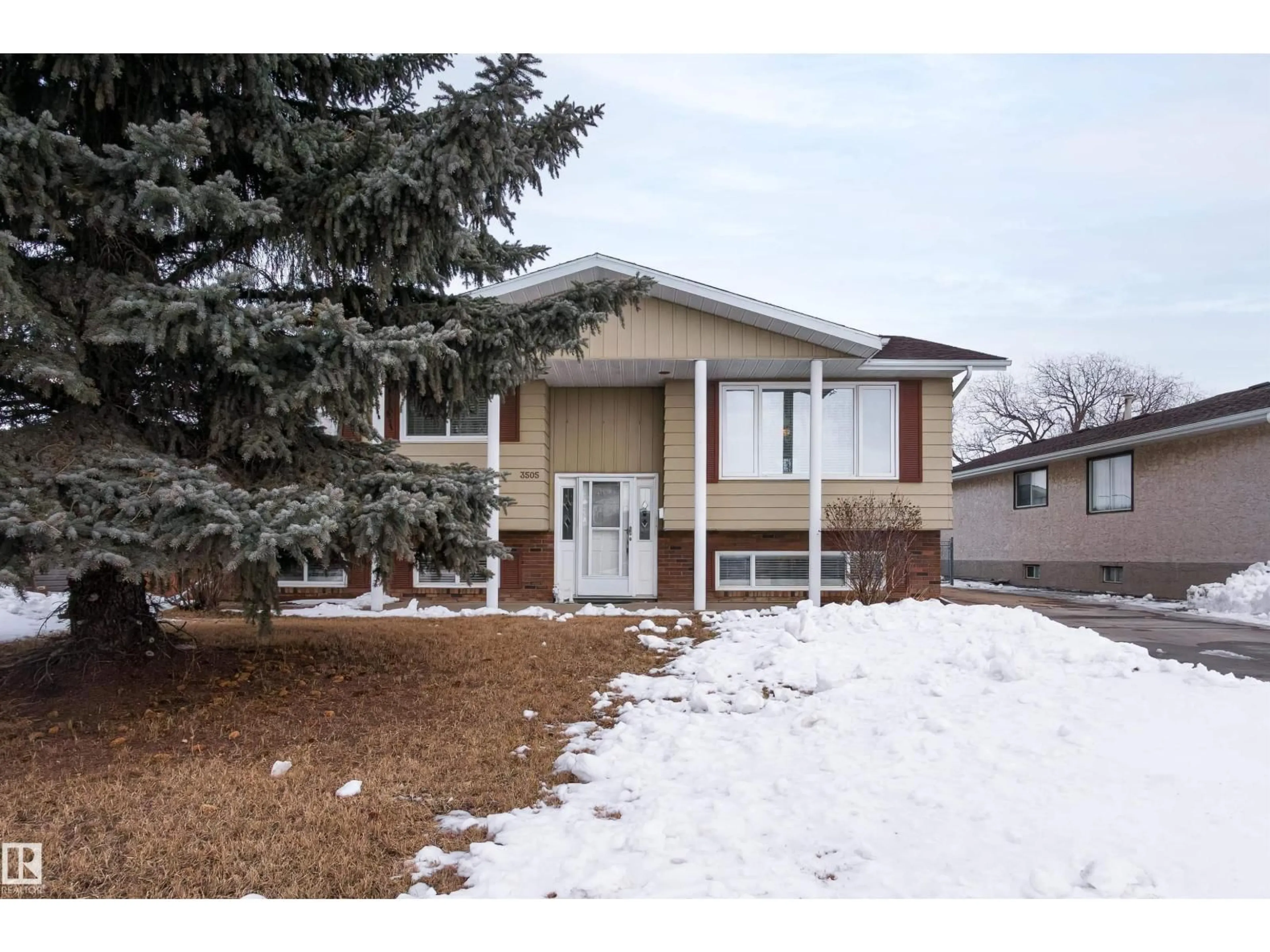 Home with vinyl exterior material, street for 3505 42 ST, Leduc Alberta T9E6A7