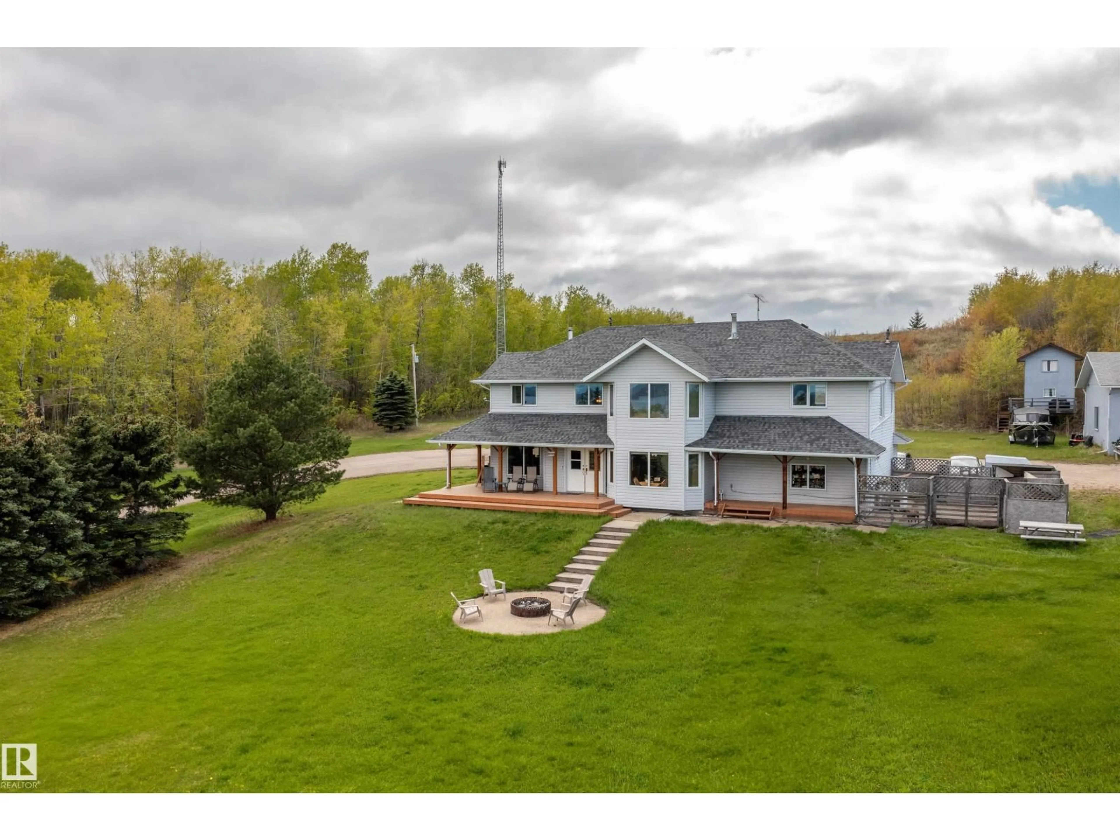 A pic from outside/outdoor area/front of a property/back of a property/a pic from drone, water/lake/river/ocean view for 1301 28 ST, Cold Lake Alberta T9M1G2