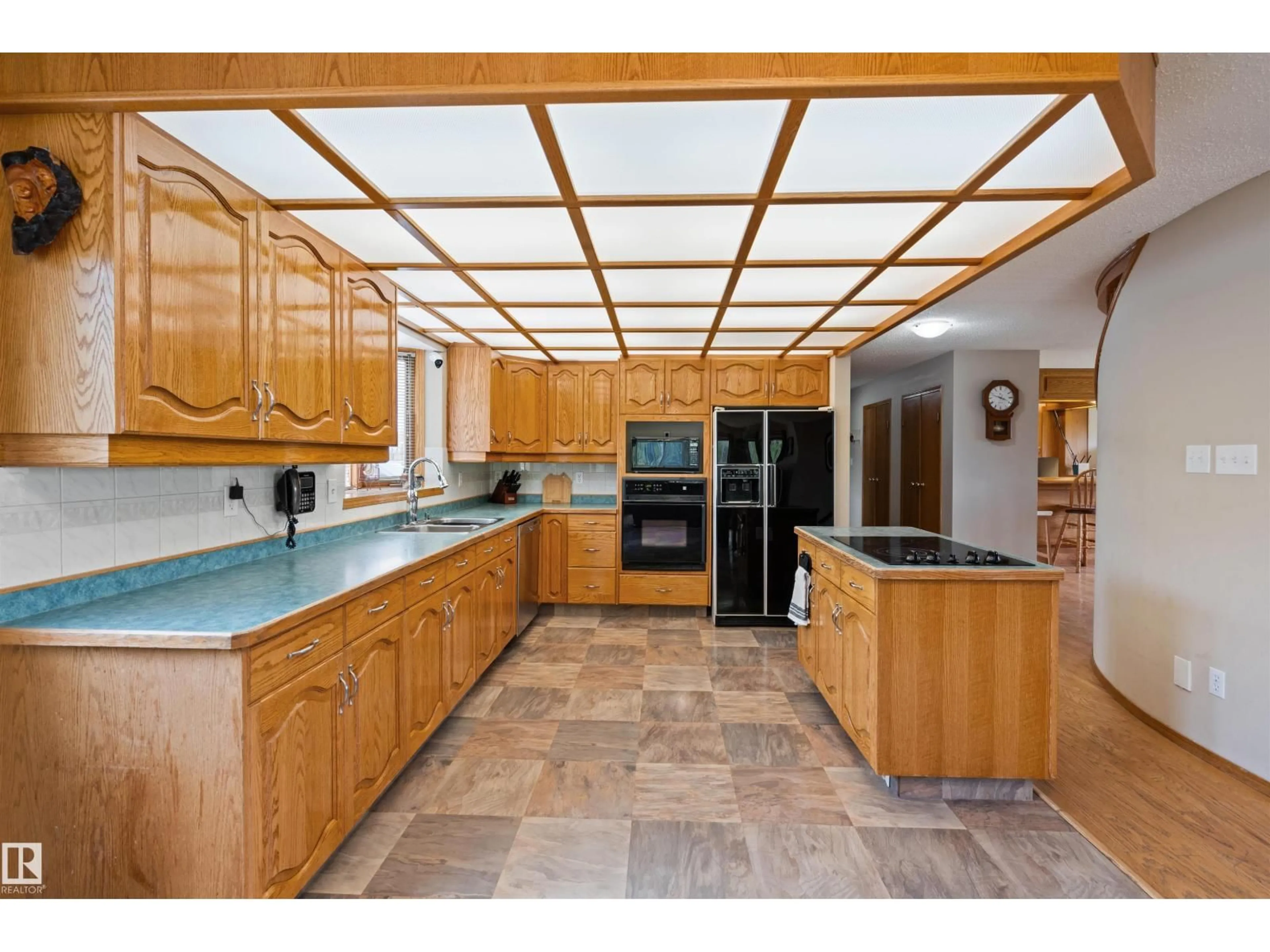 Open concept kitchen, ceramic/tile floor for 1301 28 ST, Cold Lake Alberta T9M1G2