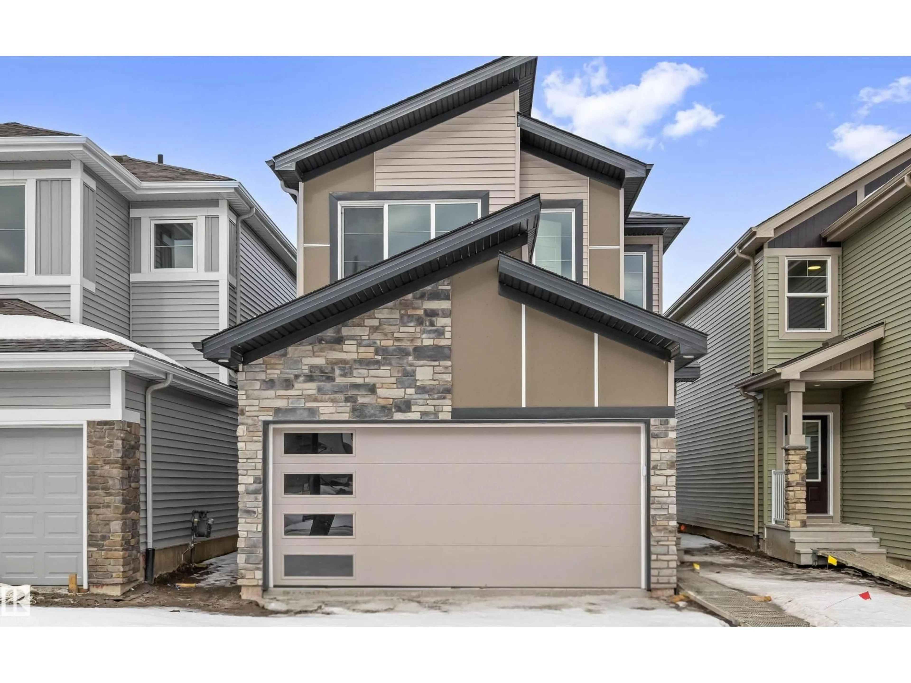 Home with vinyl exterior material, street for 8724 183 AV, Edmonton Alberta T5Z0S8