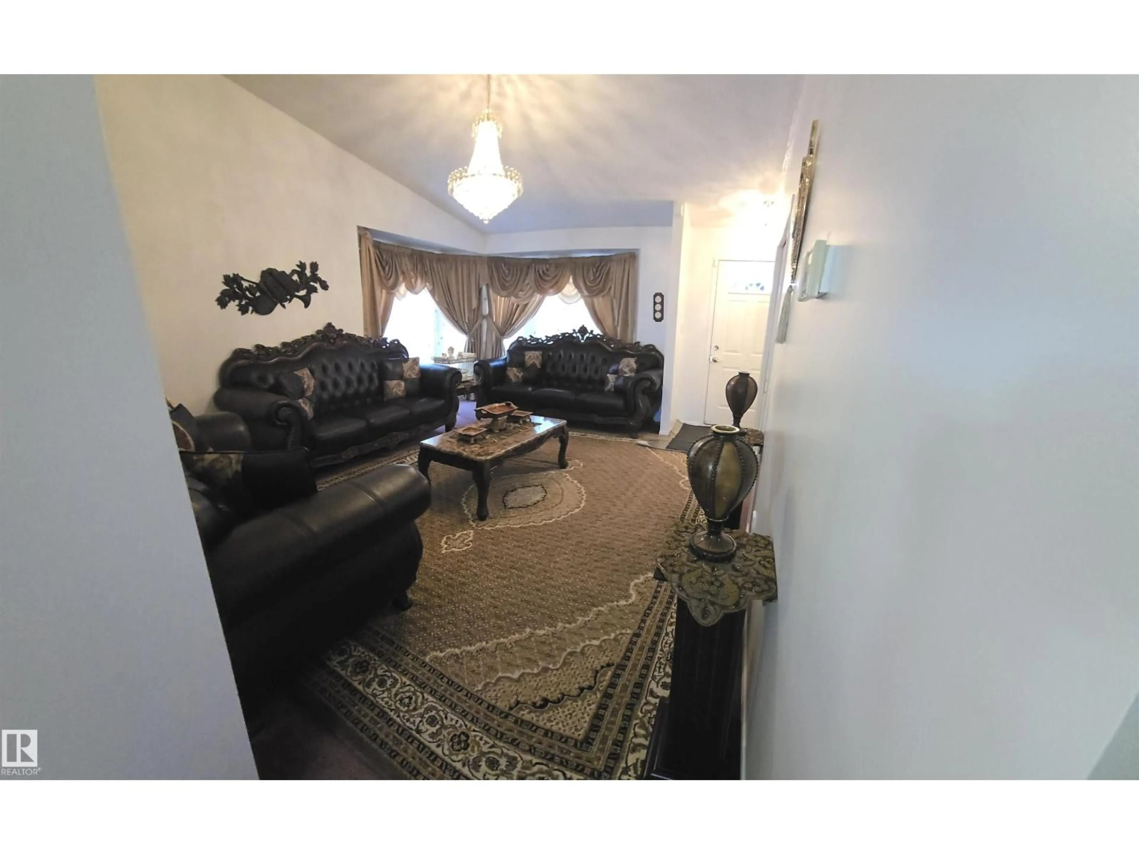 Living room with furniture, unknown for NW - 16815 91 ST, Edmonton Alberta T5Z2W7