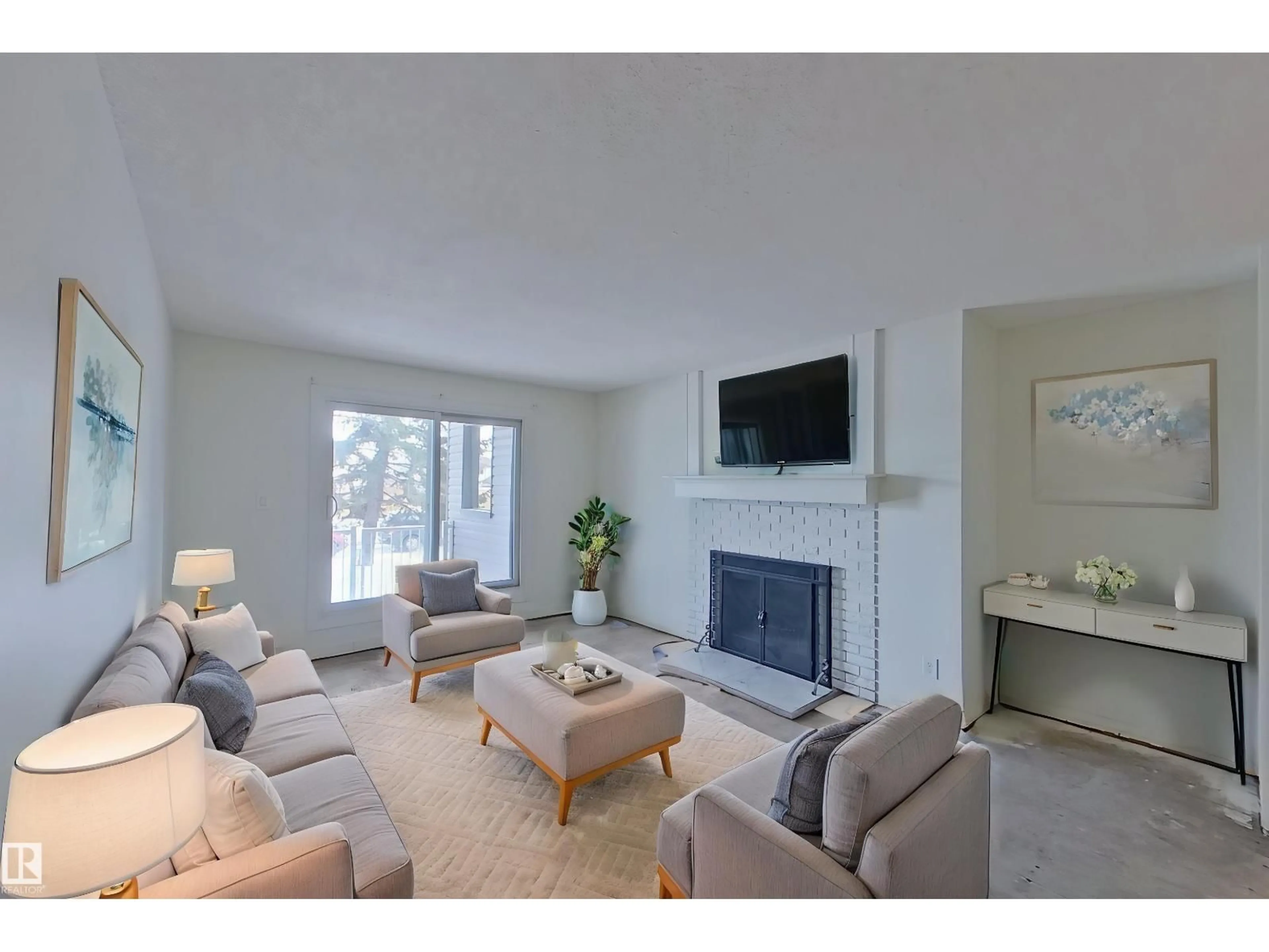 Living room with furniture, unknown for #107 - 6208 180 ST, Edmonton Alberta T5T2T2