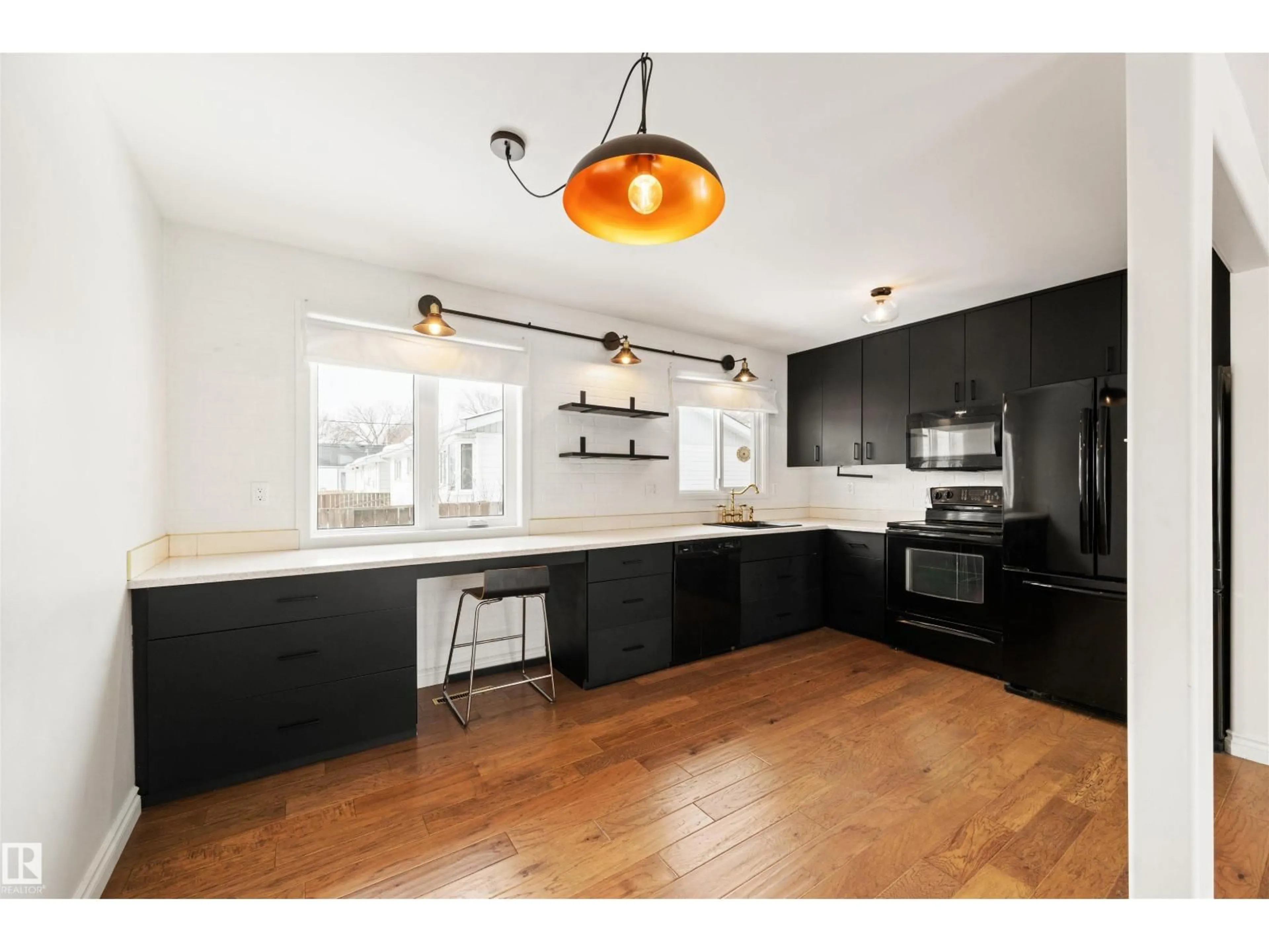 Open concept kitchen, wood/laminate floor for NW - 11052 151 ST, Edmonton Alberta T5P1W3